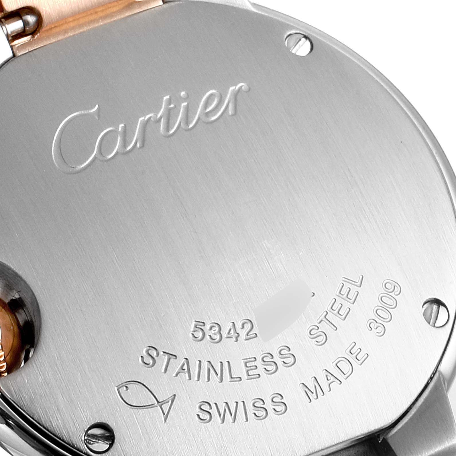 The image shows the back case of a Cartier Ballon Bleu W6920034 Women's Steel and Gold (two tone) Mother of Pearl Dial W6920034 Women's Steel and Gold (two tone) Mother of Pearl Dial watch with engravings and serial numbers visible.
