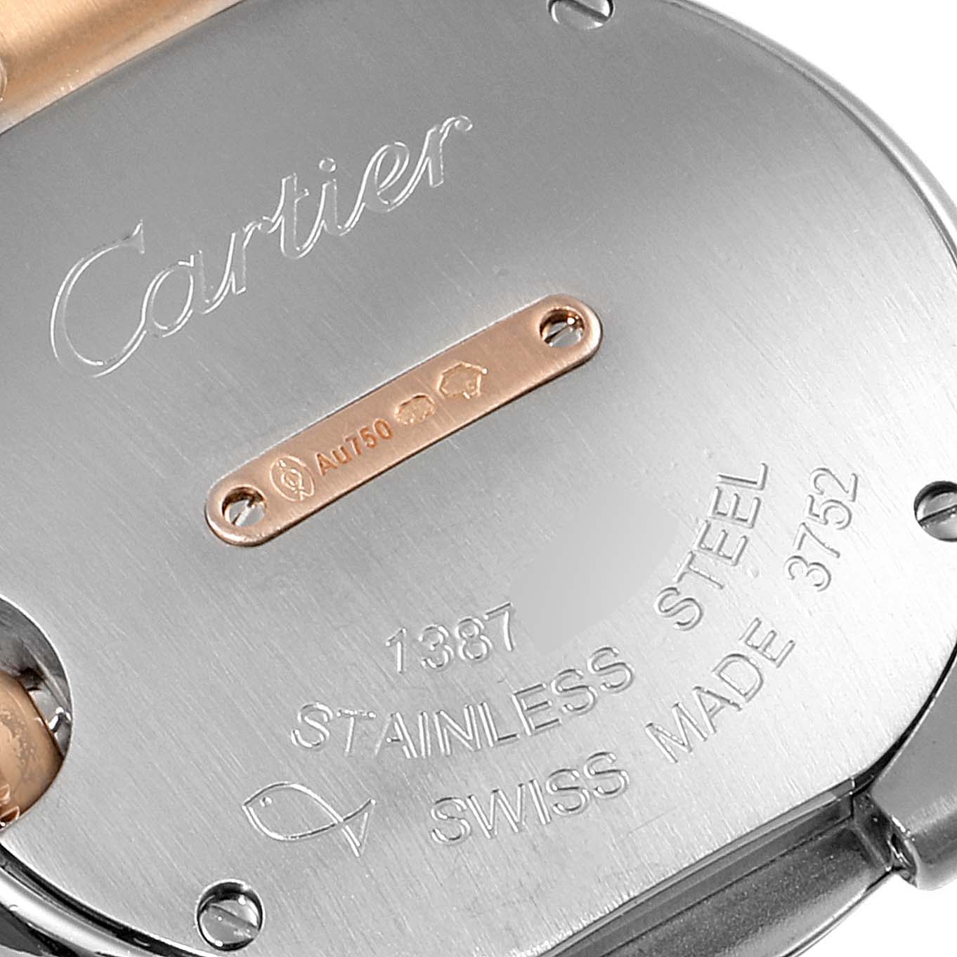 The image shows the stainless steel case back of a Cartier Ballon Bleu W3BB0005 Women's Steel and Gold (two tone) Silver Dial W3BB0005 Women's Steel and Gold (two tone) Silver Dial watch, featuring engraved inscriptions and hallmarks.