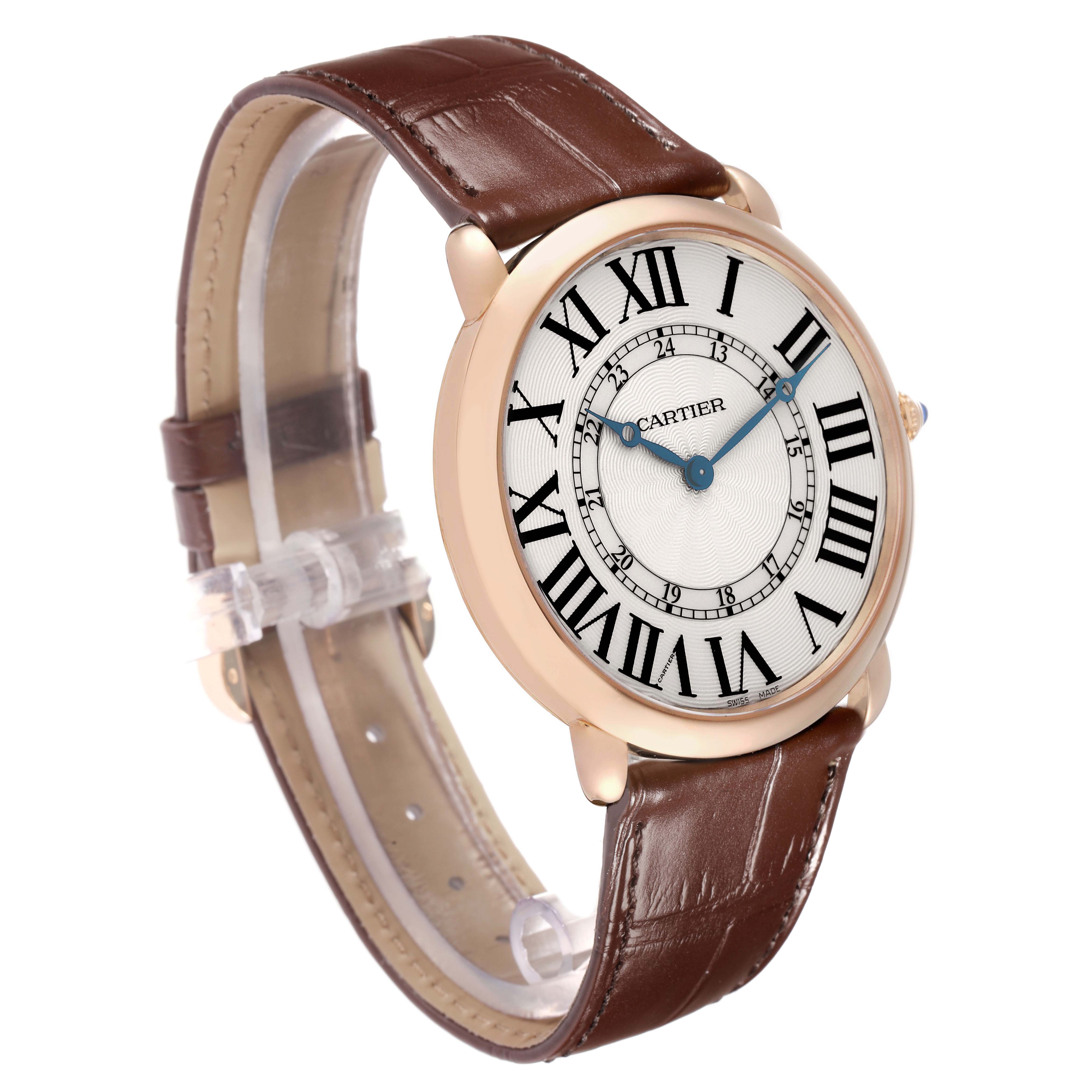 The Cartier Ronde W6801004 Men's Rose Gold Silver Dial watch is shown at a three-quarter angle, highlighting the face, Roman numerals, and leather strap.
