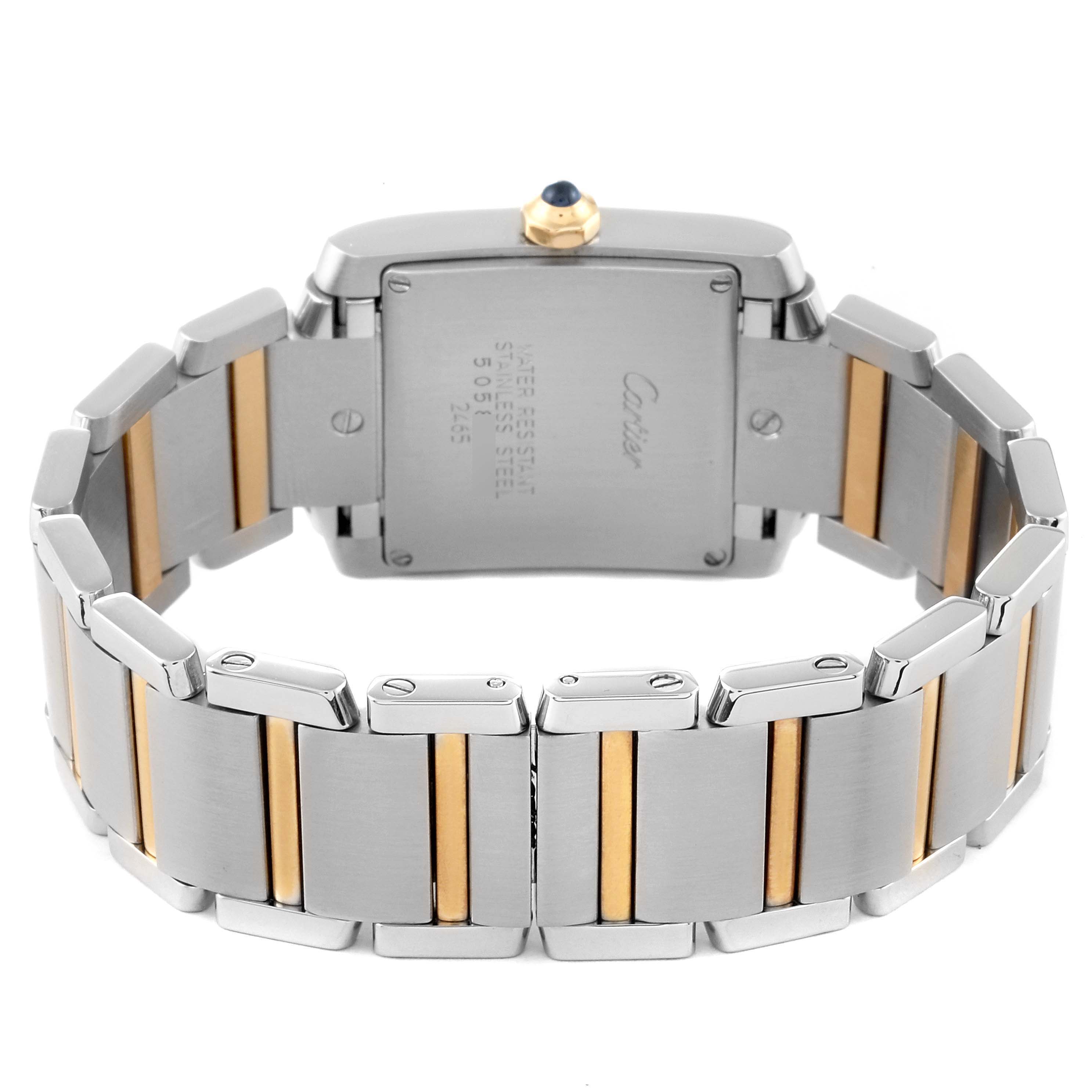 The image shows the back view of the Cartier Tank Francaise W51012Q4 Women
s Steel and Gold (two tone) Silver Dial W51012Q4 Women
s Steel and Gold (two tone) Silver Dial watch, highlighting the stainless steel and gold bracelet and the case back.