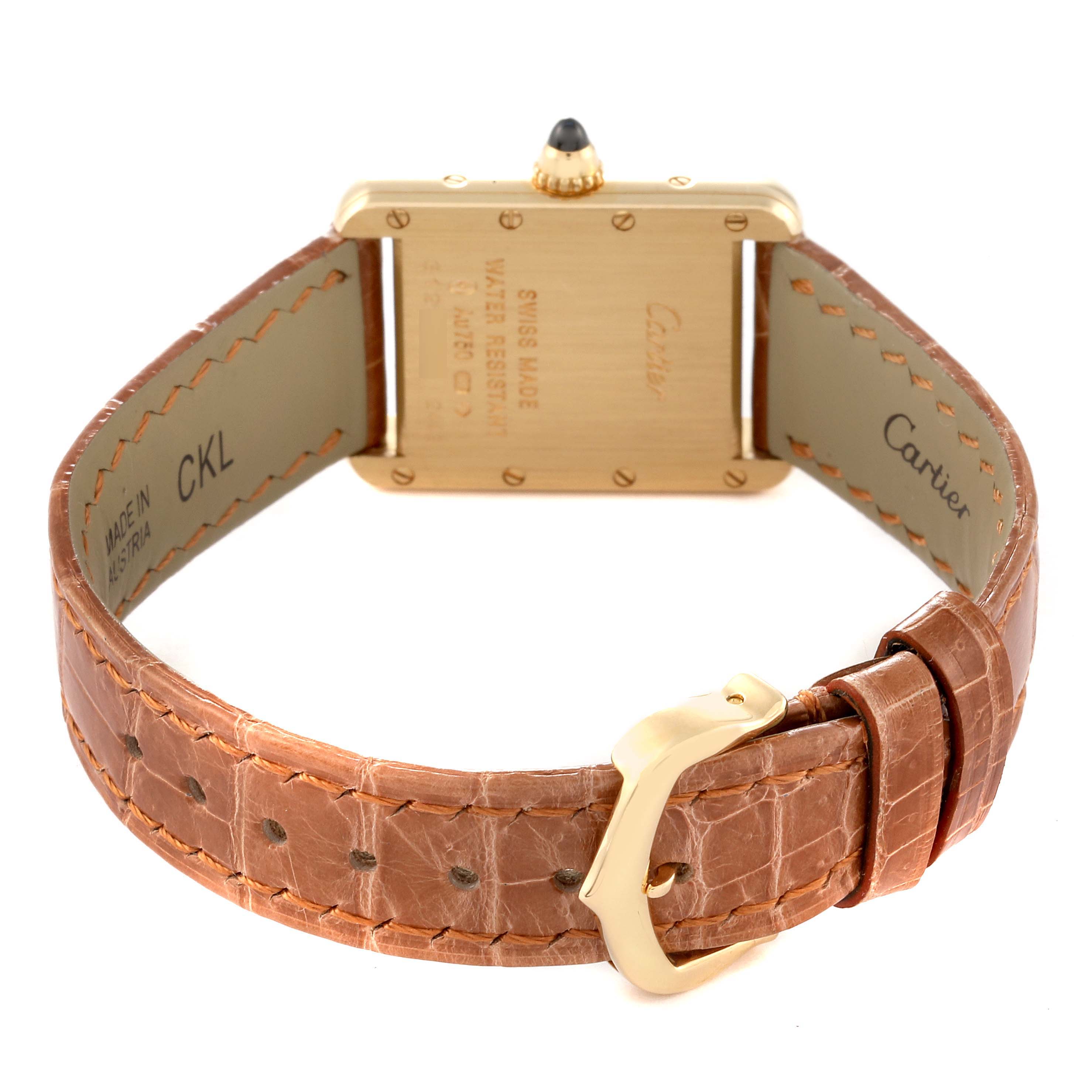 The image shows the back view of the Cartier Tank Louis W1529856 Women's Yellow Gold Silver Dial W1529856 Women's Yellow Gold Silver Dial watch, highlighting the leather strap and buckle.