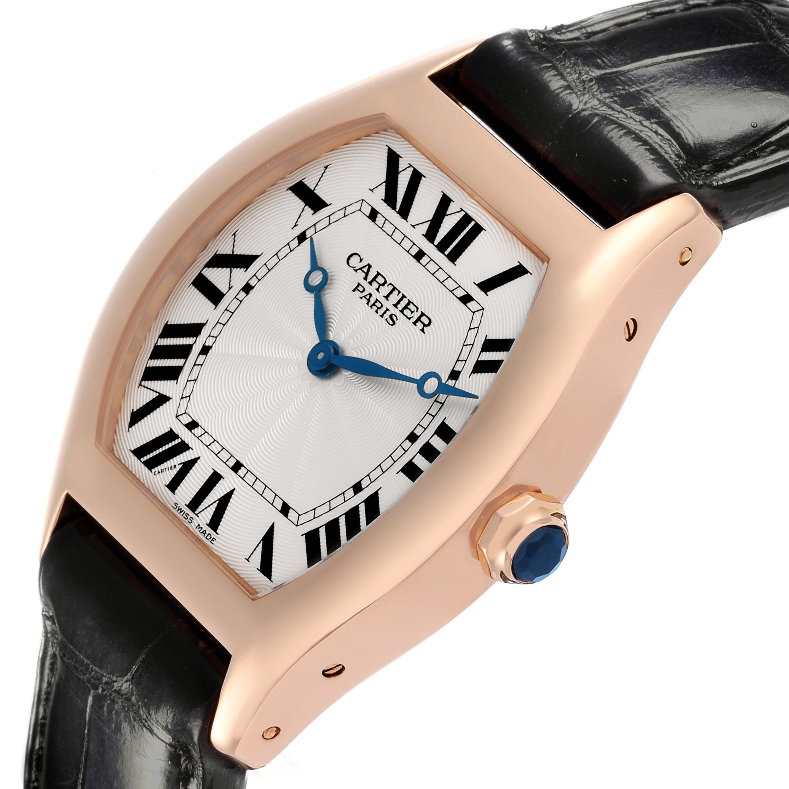 The Cartier Tortue 2498E Men's Rose Gold Silver Dial 2498E Men's Rose Gold Silver Dial watch is shown at an angle highlighting its face, Roman numerals, blue hands, crown, and leather strap.
