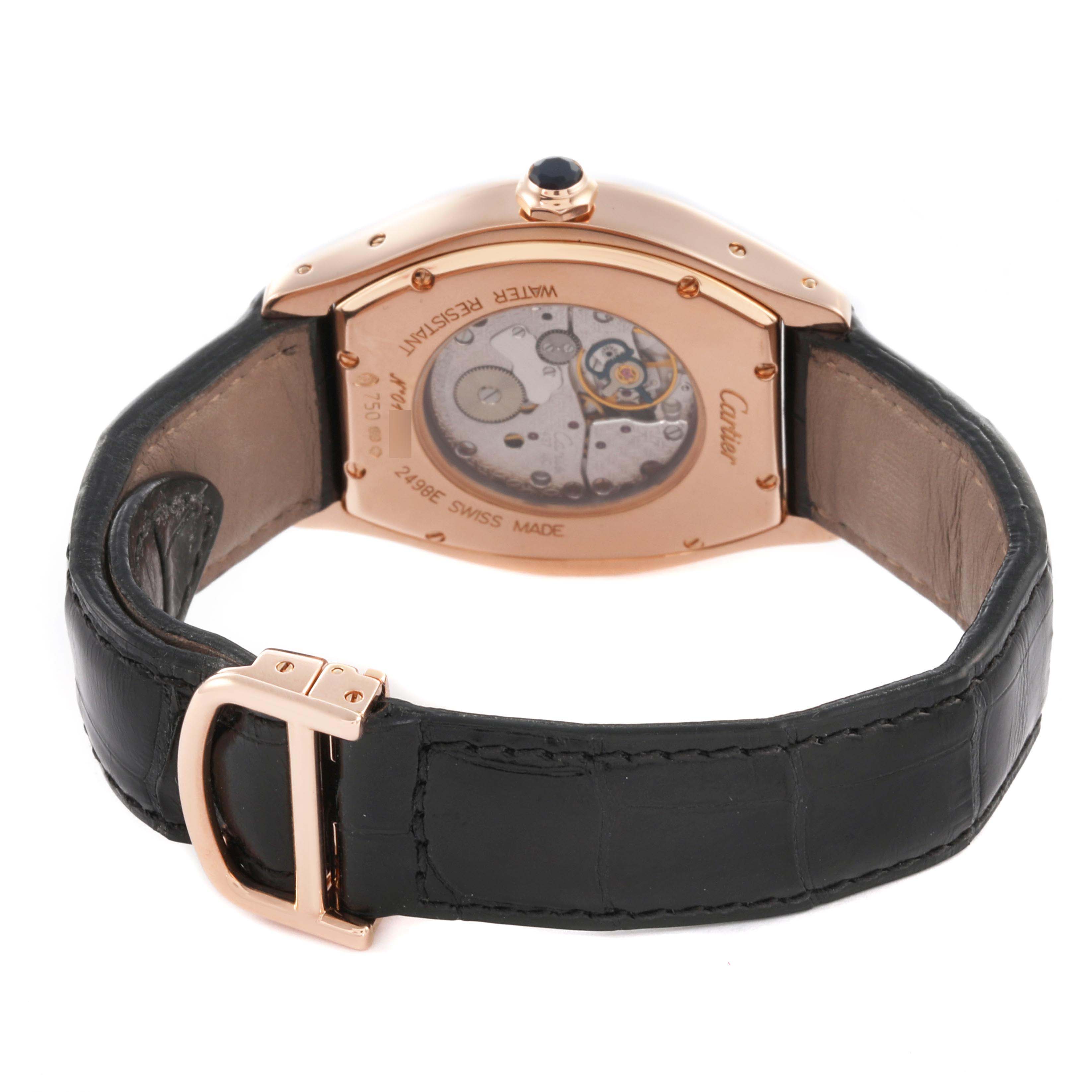 The image shows the back angle of the Cartier Tortue 2498E Men's Rose Gold Silver Dial 2498E Men's Rose Gold Silver Dial watch, highlighting the movement and leather strap.