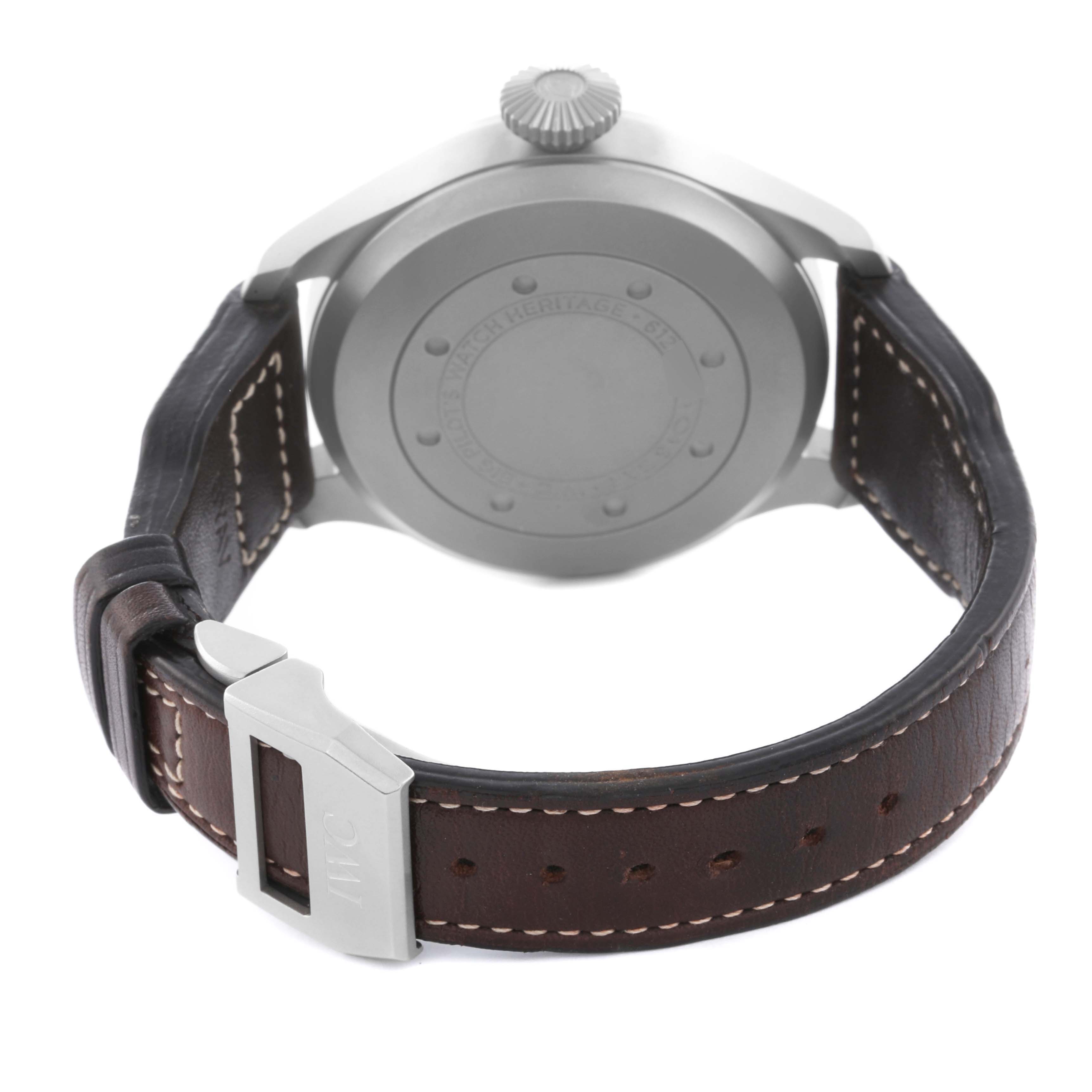 The image shows the back of the IWC Pilot IW501004 Men's Titanium Black Dial IW501004 Men's Titanium Black Dial watch and its brown leather strap with a buckle.