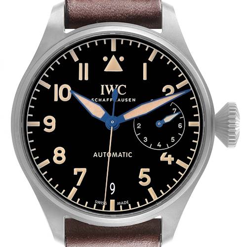 The IWC Pilot watch is shown from the front, featuring the dial, hands, crown, and part of the strap.