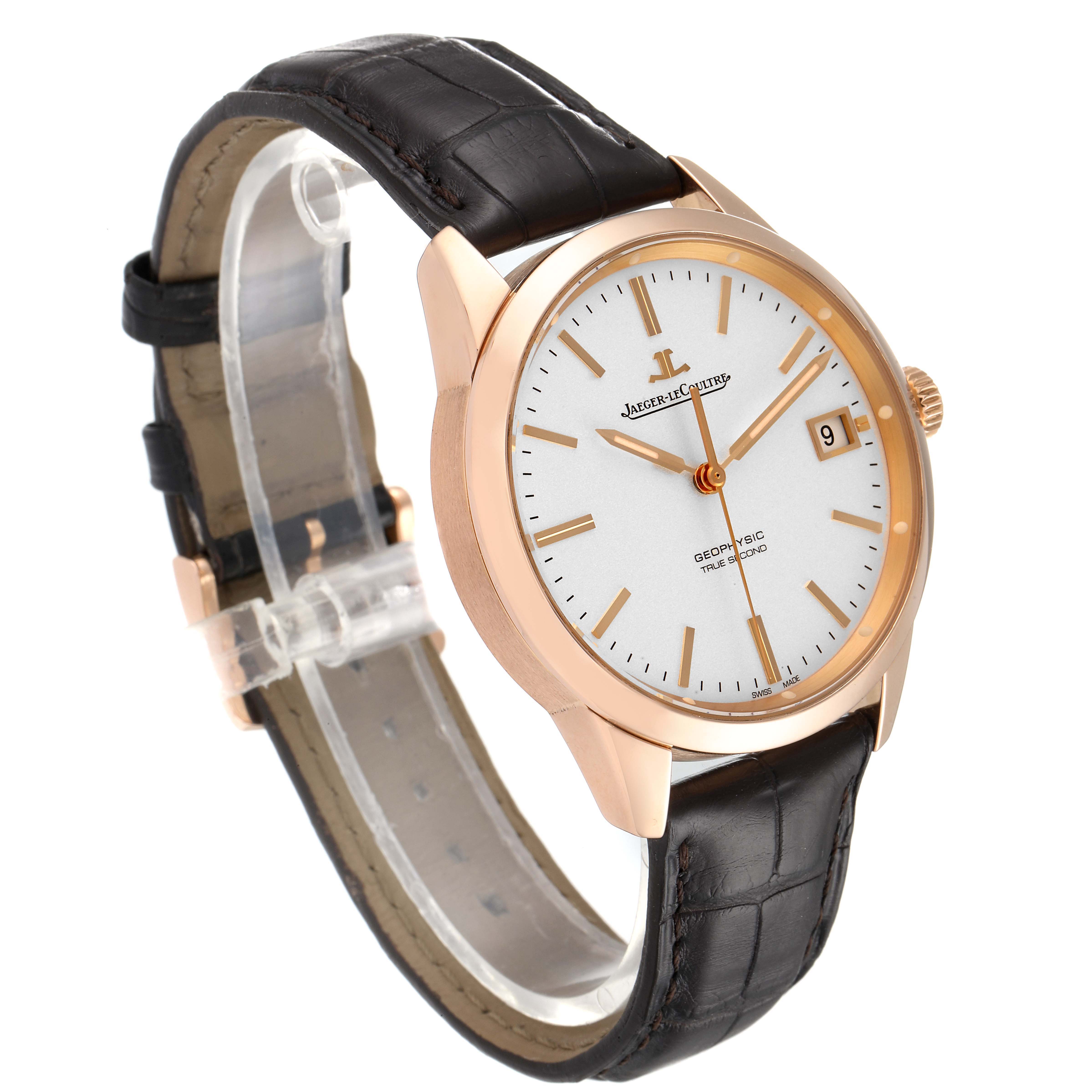 The Jaeger LeCoultre Geophysic Q8012520 Men's Rose Gold Silver Dial Q8012520 Men's Rose Gold Silver Dial watch is shown at a three-quarter angle, displaying the face, leather strap, and crown.
