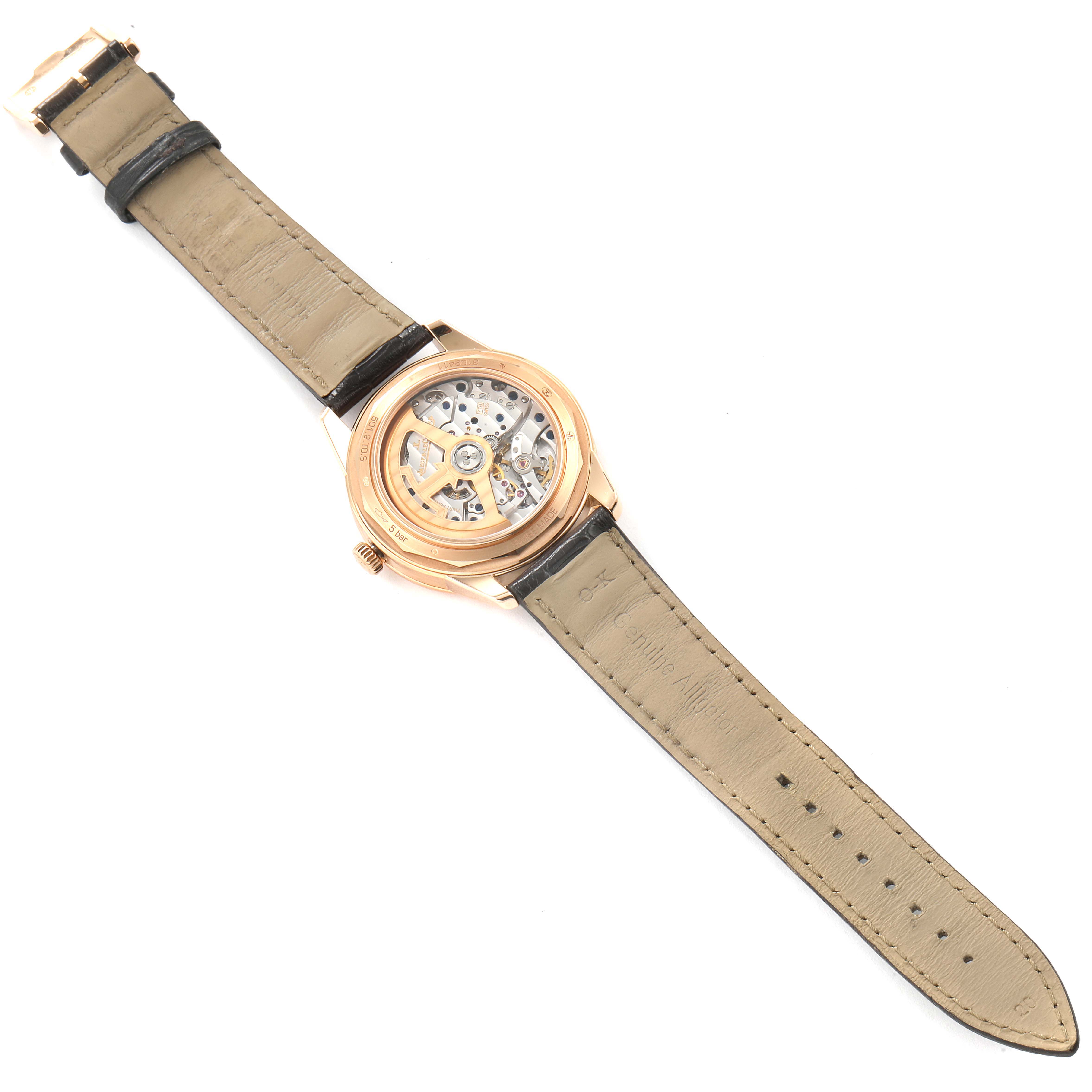 This image shows the back view of the Geophysic model by Jaeger LeCoultre, highlighting its transparent case-back and internal mechanism.