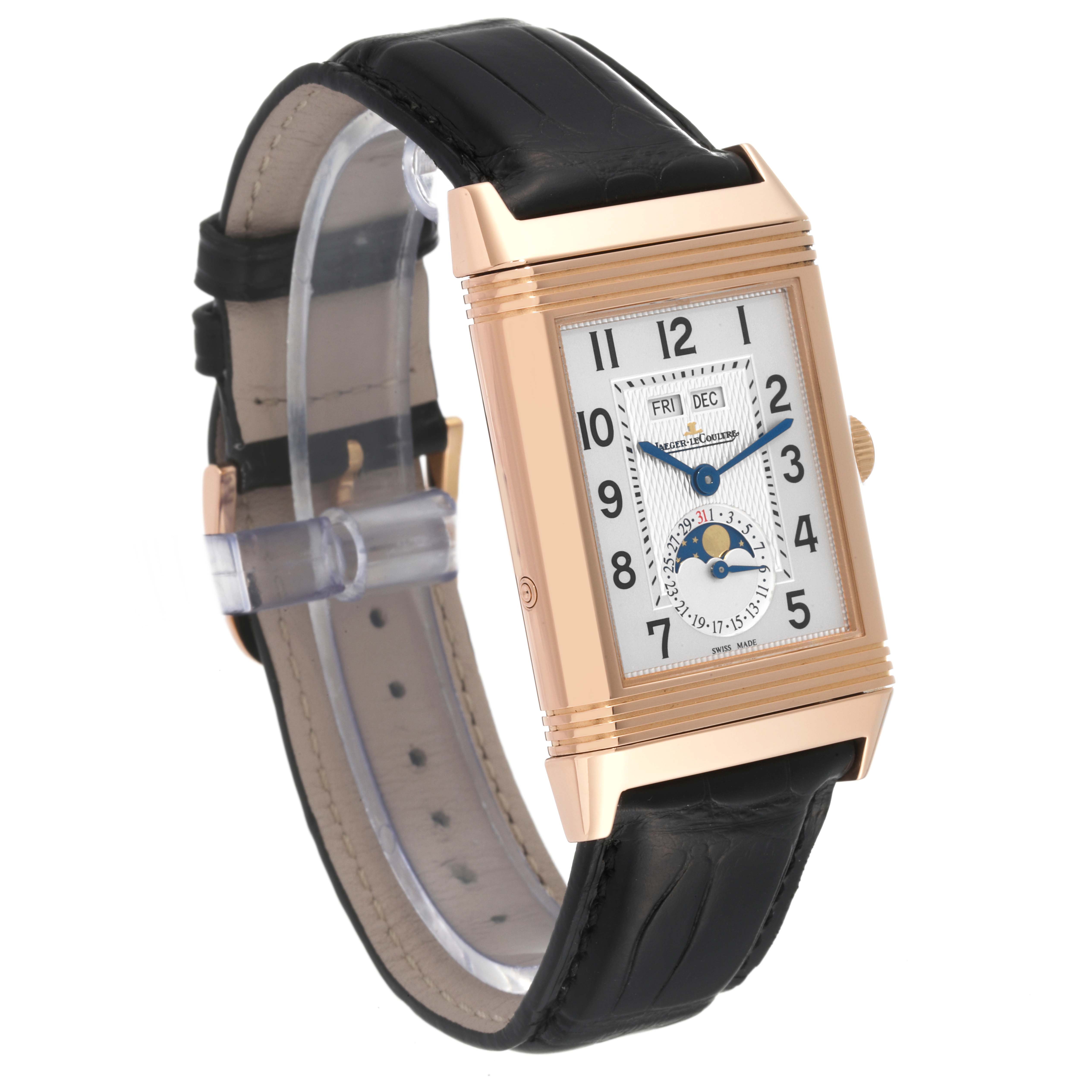 The image shows a Jaeger-LeCoultre Reverso watch at an angle highlighting the watch face, case, and black leather strap.