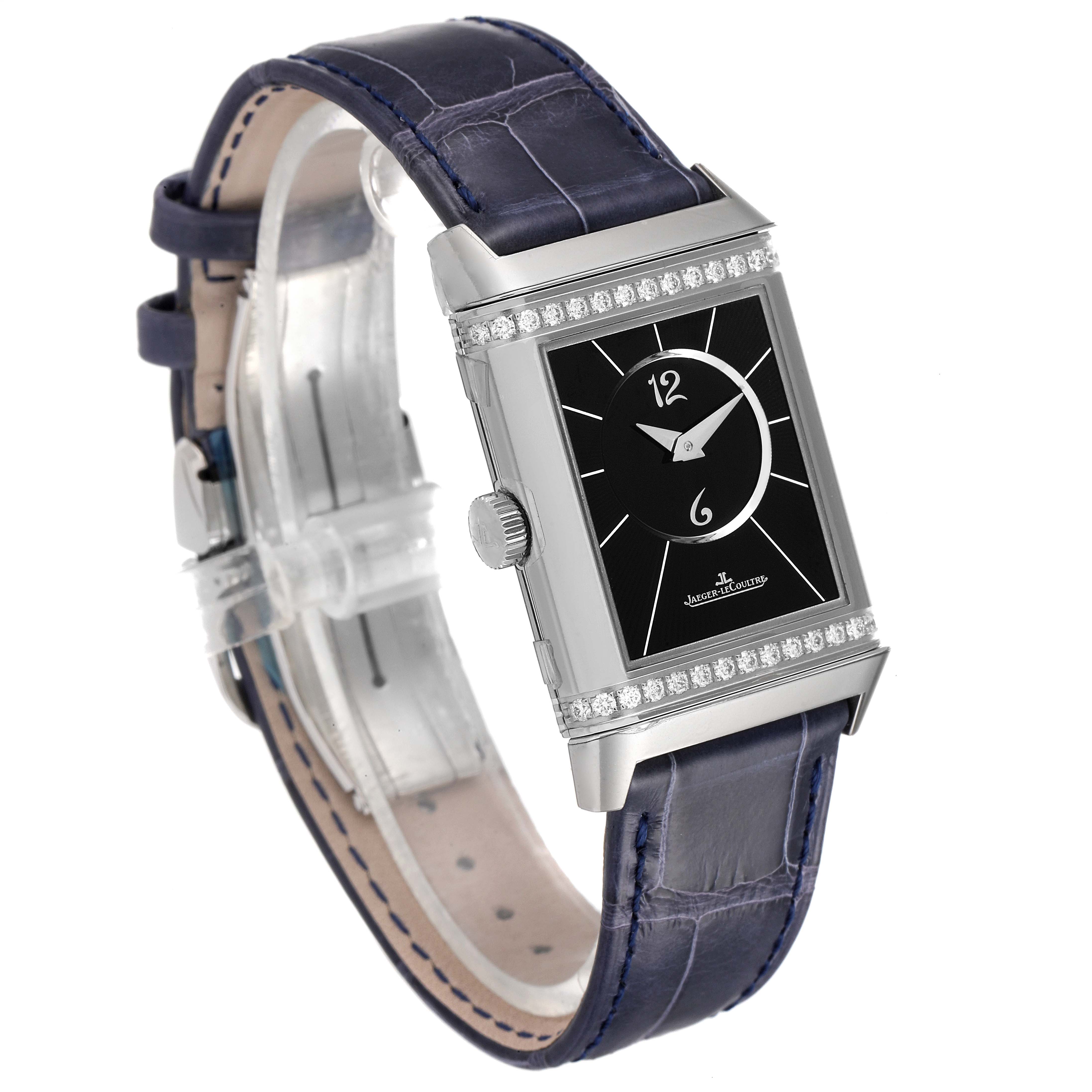 The image shows a Jaeger-LeCoultre Reverso watch at a three-quarter angle, featuring the face, rectangular case, crown, and leather strap.