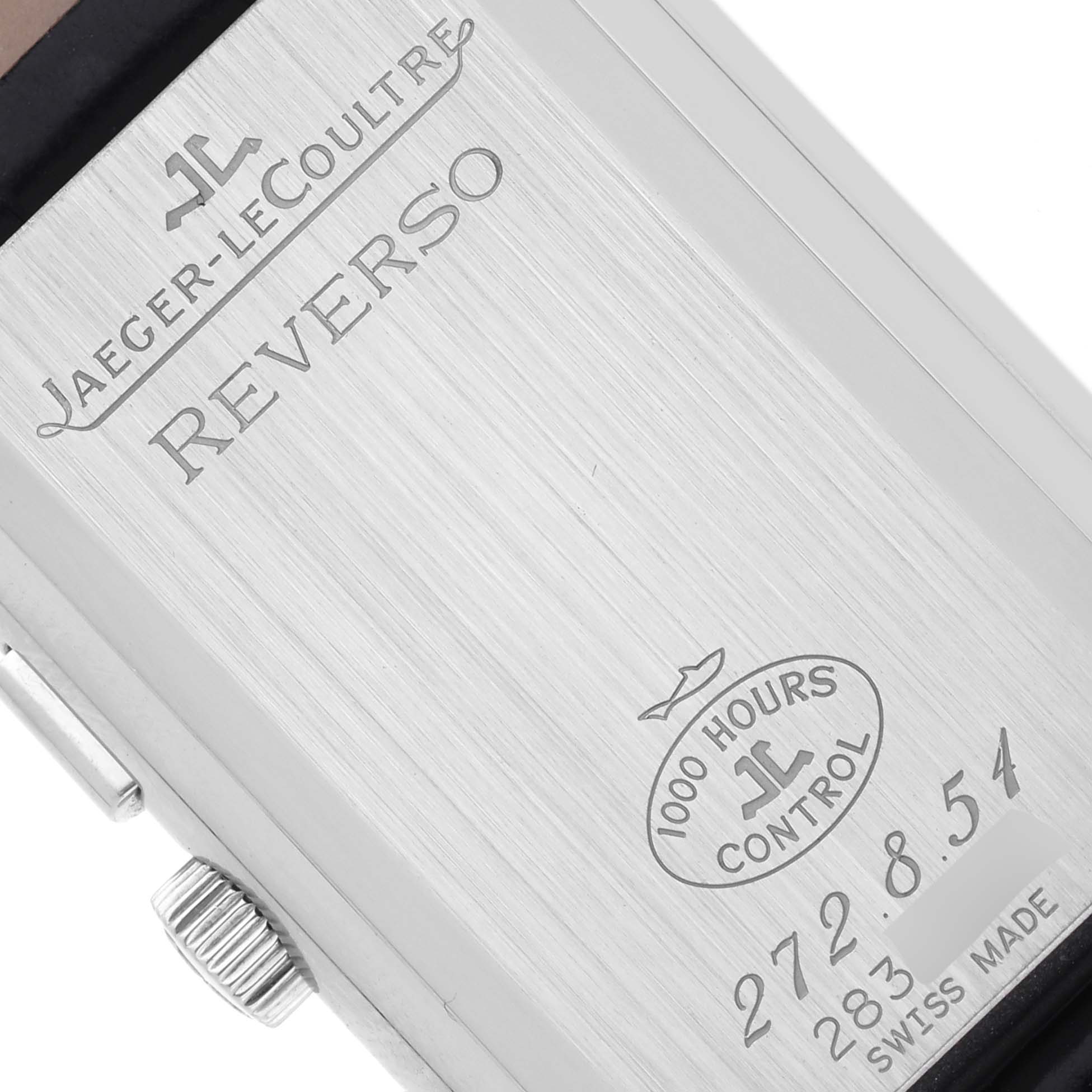 The image shows the back of the Jaeger-LeCoultre Reverso, highlighting its engravings and crown.