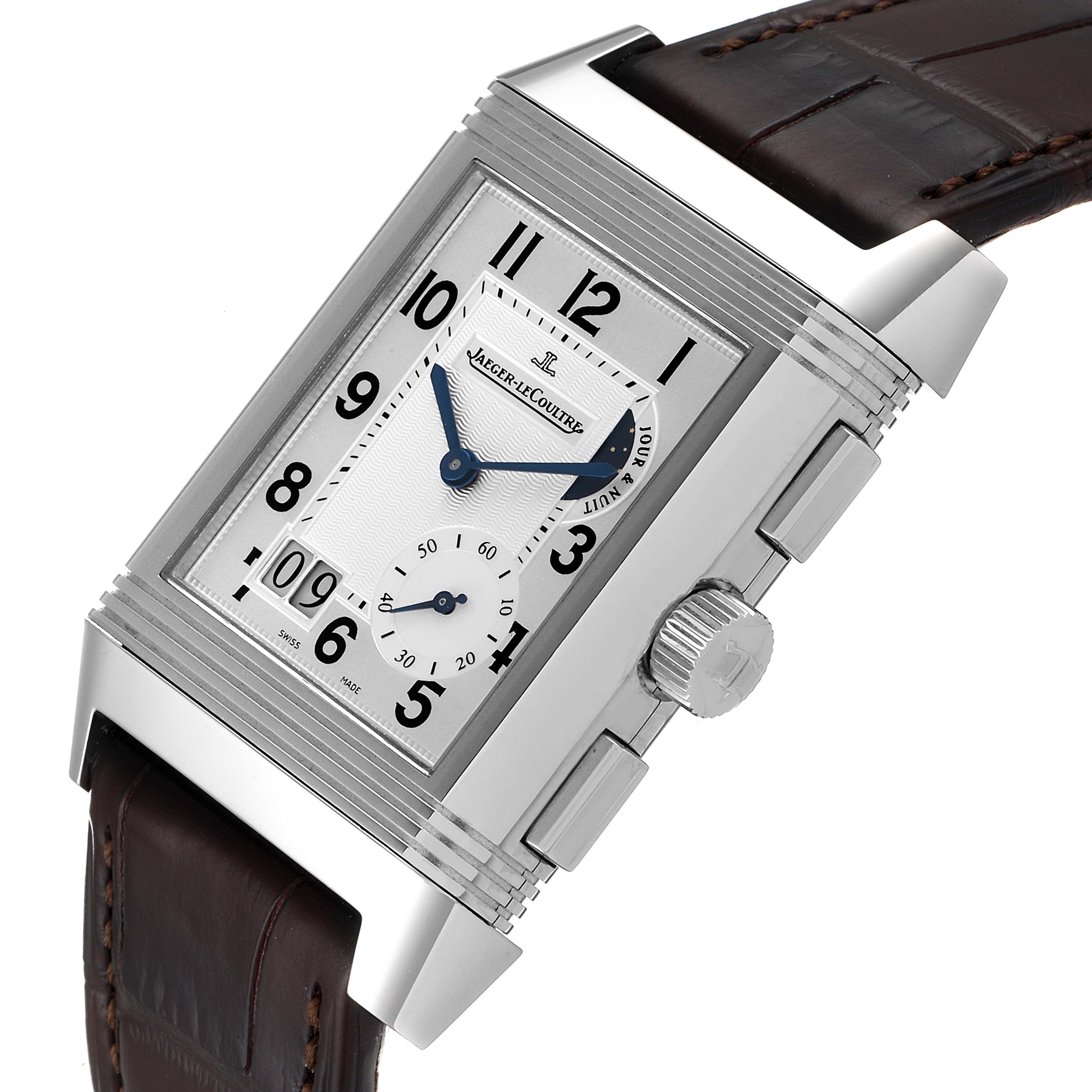 The image shows a Jaeger LeCoultre Reverso Q3028420 Men's Stainless Steel Silver Dial Q3028420 Men's Stainless Steel Silver Dial model watch from an angled front view, highlighting the dial, crown, and part of the leather strap.