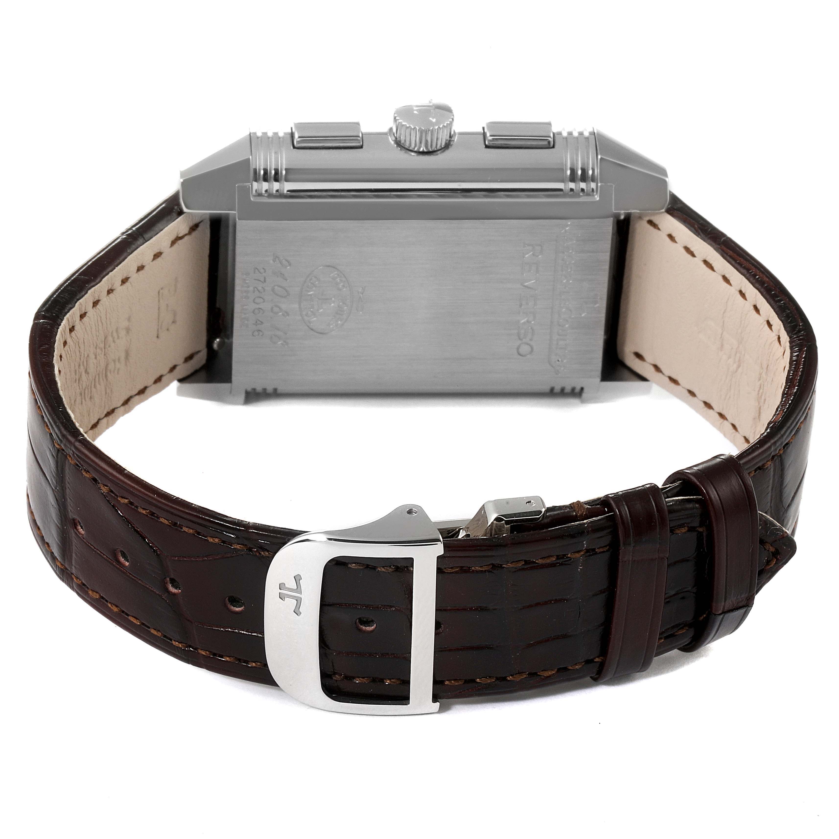 This image shows the back view of a Jaeger-LeCoultre Reverso watch with a brown leather strap and the stainless steel case back.