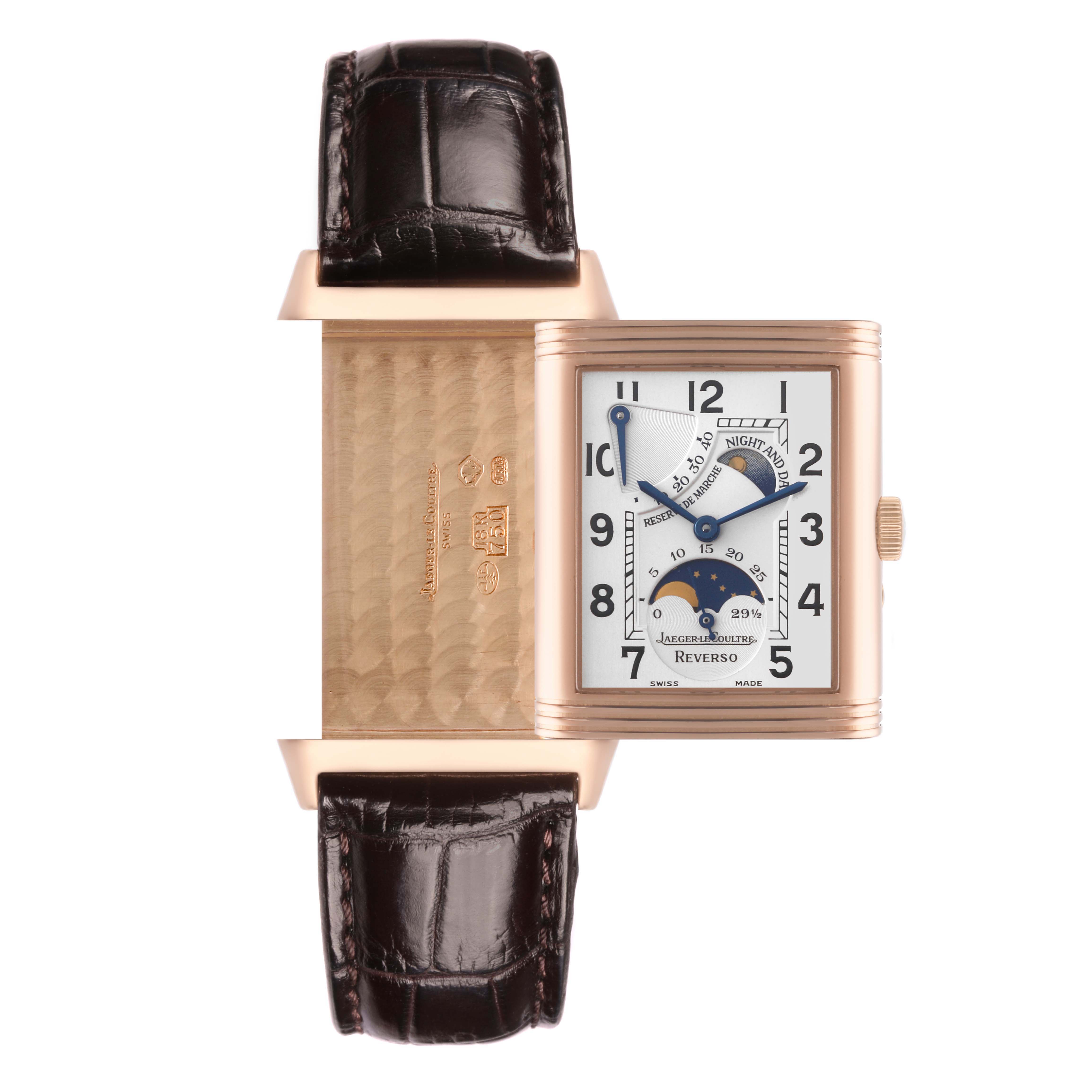 The Jaeger-LeCoultre Reverso watch is shown with the face turned to the side, revealing the inner case and the dial.