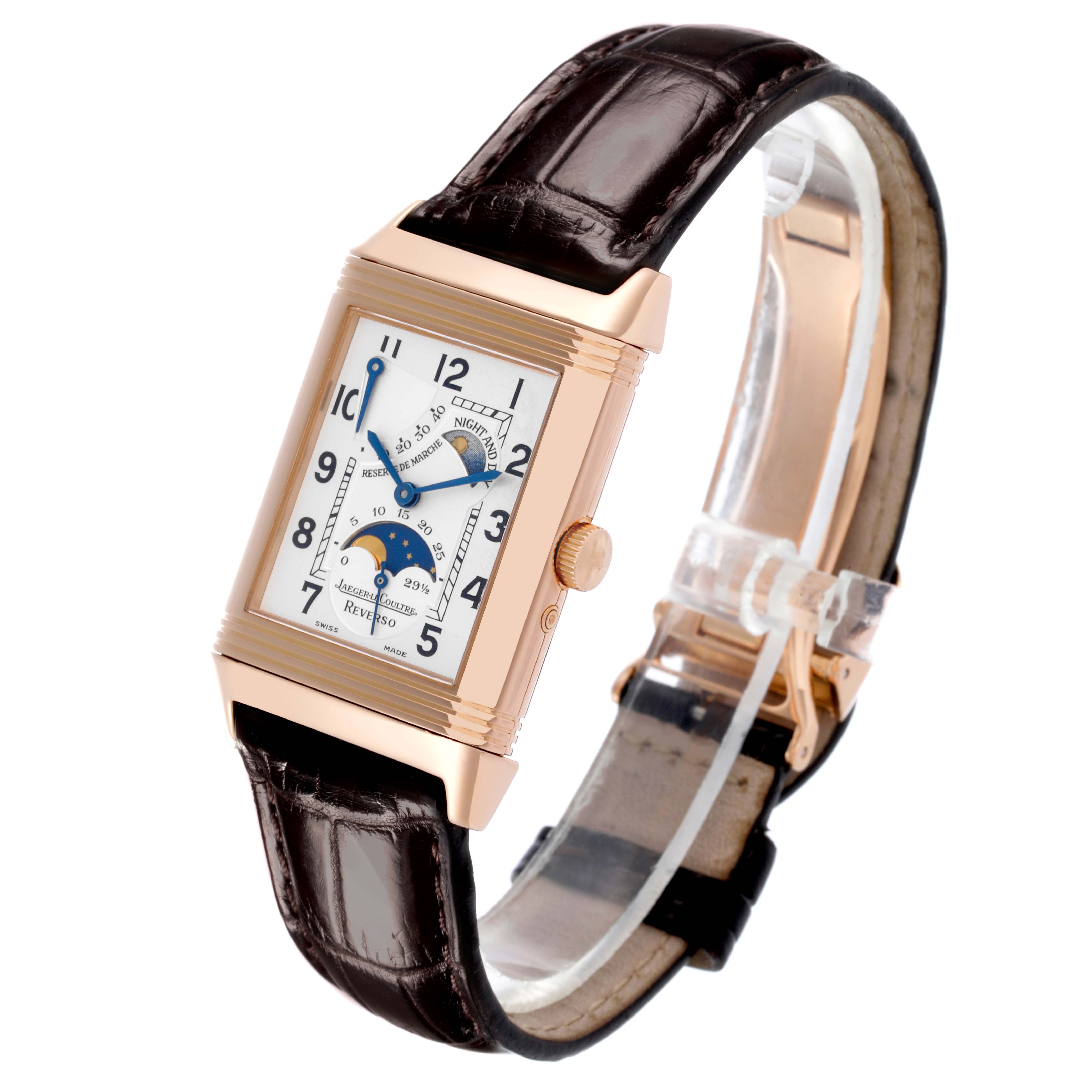 The image shows a Jaeger-LeCoultre Reverso watch at a slight angle, displaying the face, crown, and leather strap.