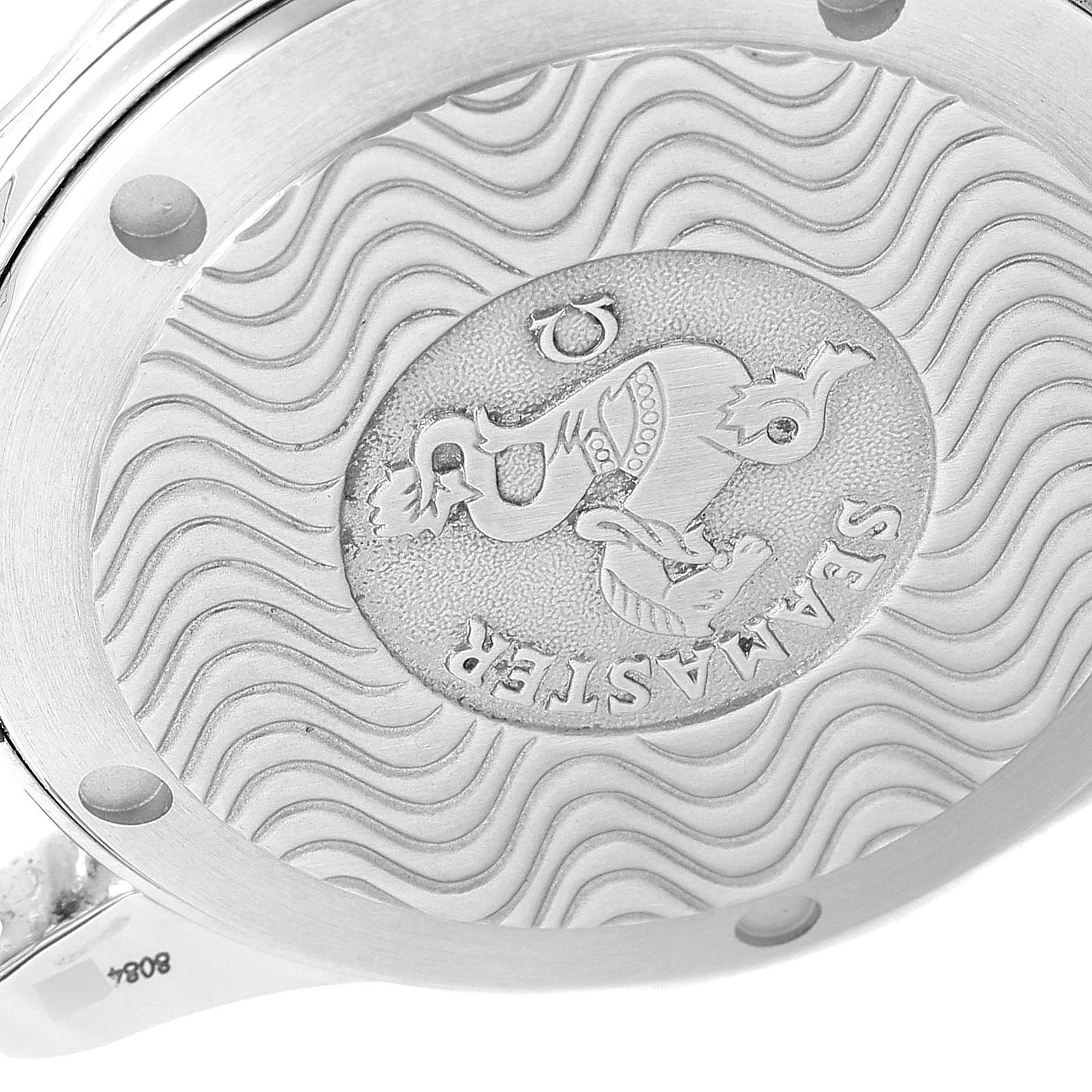 The image shows the engraved case back of an Omega Seamaster 2050.71.00 Men's Stainless Steel Mother of Pearl Dial 2050.71.00 Men's Stainless Steel Mother of Pearl Dial watch shot from a close-up angle.