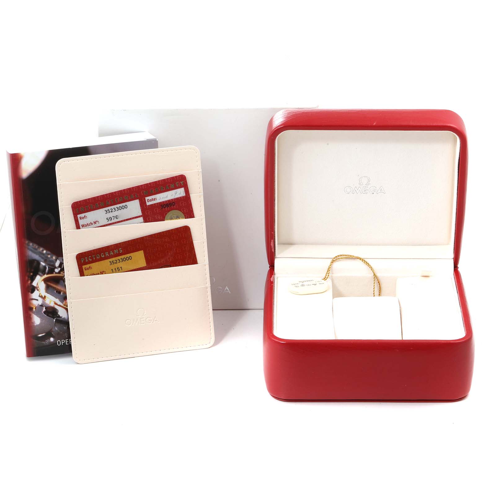 The image shows an Omega Speedmaster 3523.30.00 Men
s Stainless Steel Silver Dial 3523.30.00 Men
s Stainless Steel Silver Dial watch box, warranty cards in a cardholder, and a manual.