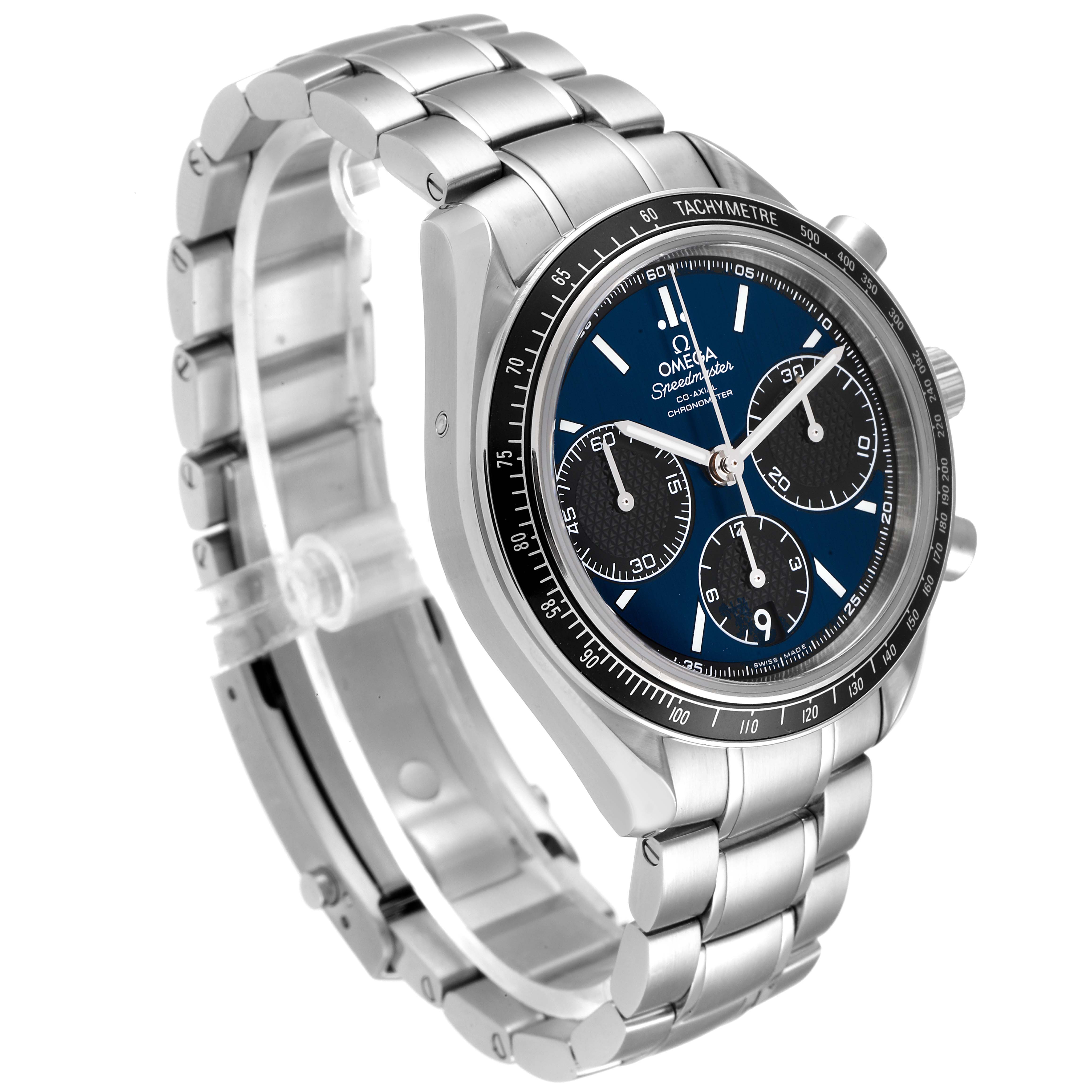 The Omega Speedmaster 326.30.40.50.03.001 Men
s Stainless Steel Blue Dial 326.30.40.50.03.001 Men
s Stainless Steel Blue Dial watch is shown from a 3/4 angle, highlighting the case, dial, chronograph subdials, bezel, and bracelet.