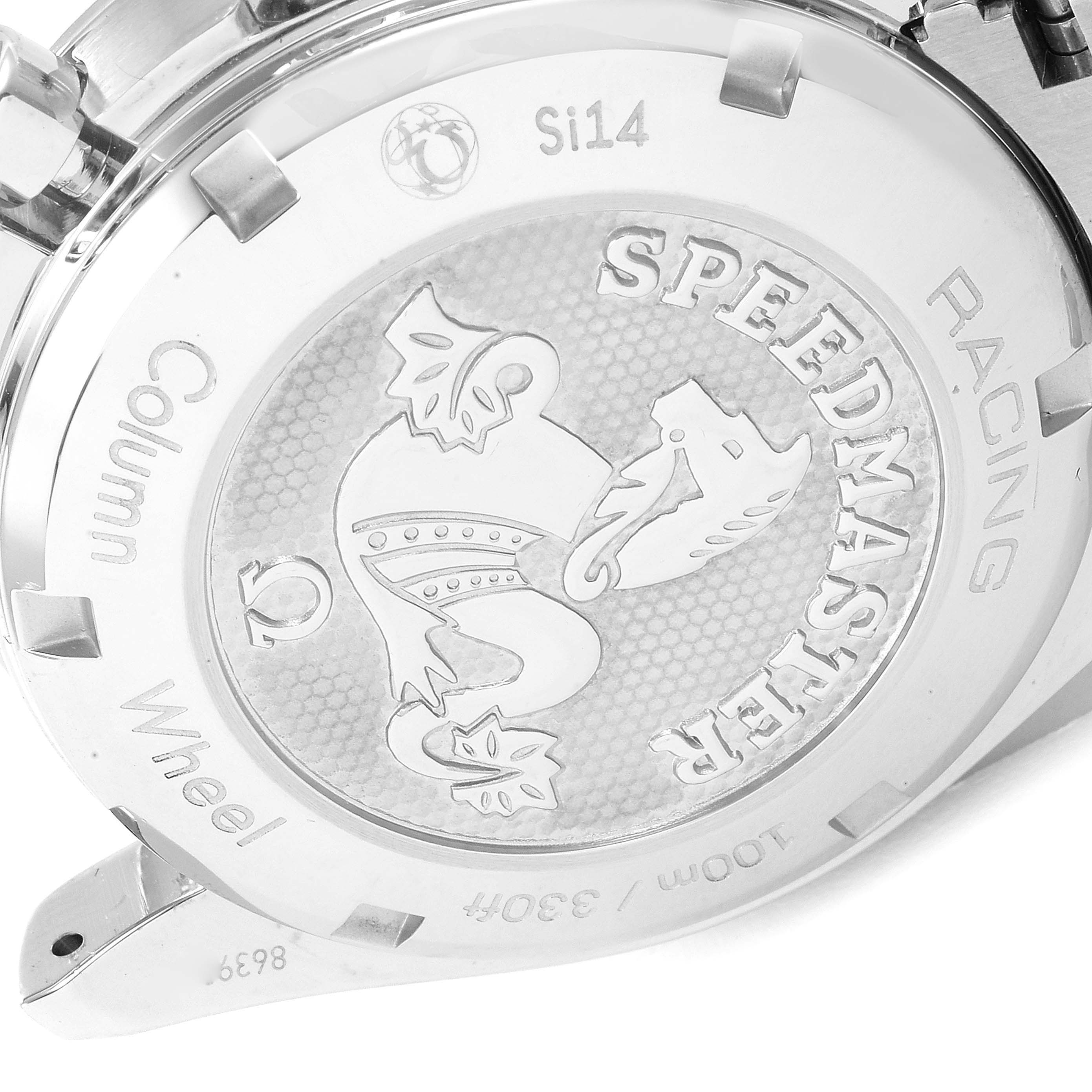 The image shows the back case of an Omega Speedmaster 326.30.40.50.02.001 Men's Stainless Steel Silver Dial 326.30.40.50.02.001 Men's Stainless Steel Silver Dial Racing watch at an angled close-up, highlighting the engravings and logo.