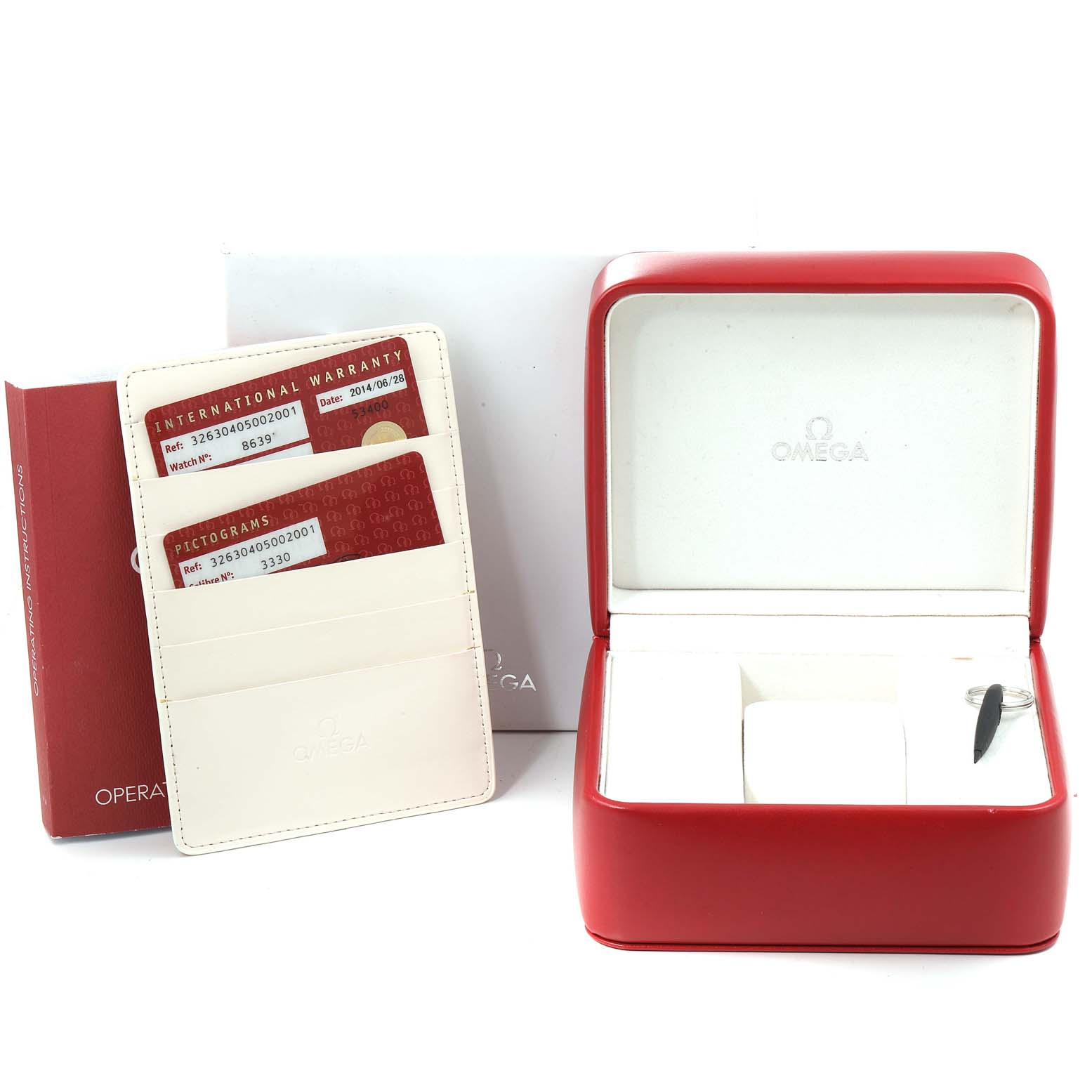 The image shows an Omega Speedmaster 326.30.40.50.02.001 Men's Stainless Steel Silver Dial 326.30.40.50.02.001 Men's Stainless Steel Silver Dial watch box, warranty cards, and a booklet at a straight-on angle.