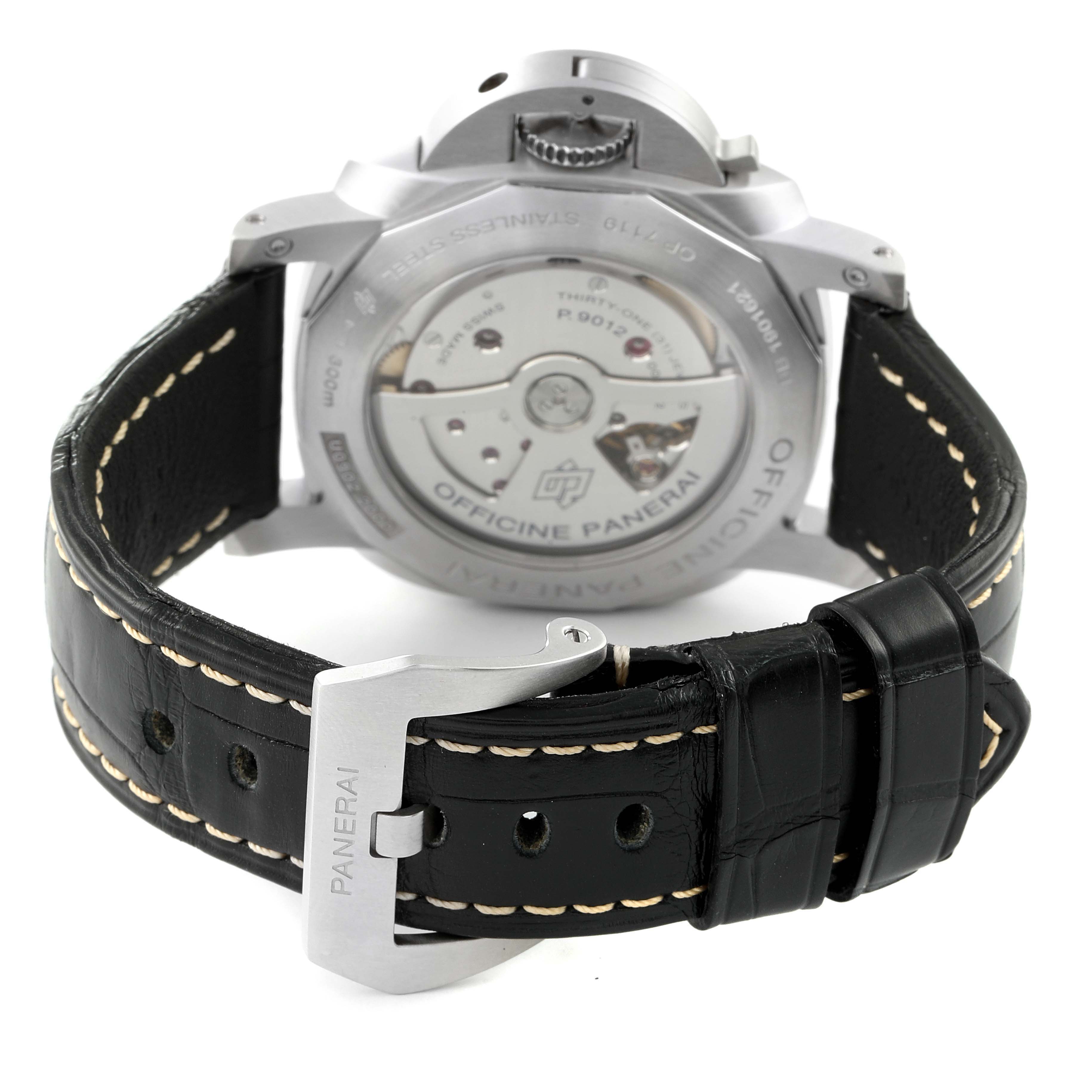 This image shows the rear view of a Panerai Luminor PAM01321 Men
s Stainless Steel Black Dial PAM01321 Men
s Stainless Steel Black Dial watch, highlighting the open case back and black leather strap with white stitching.