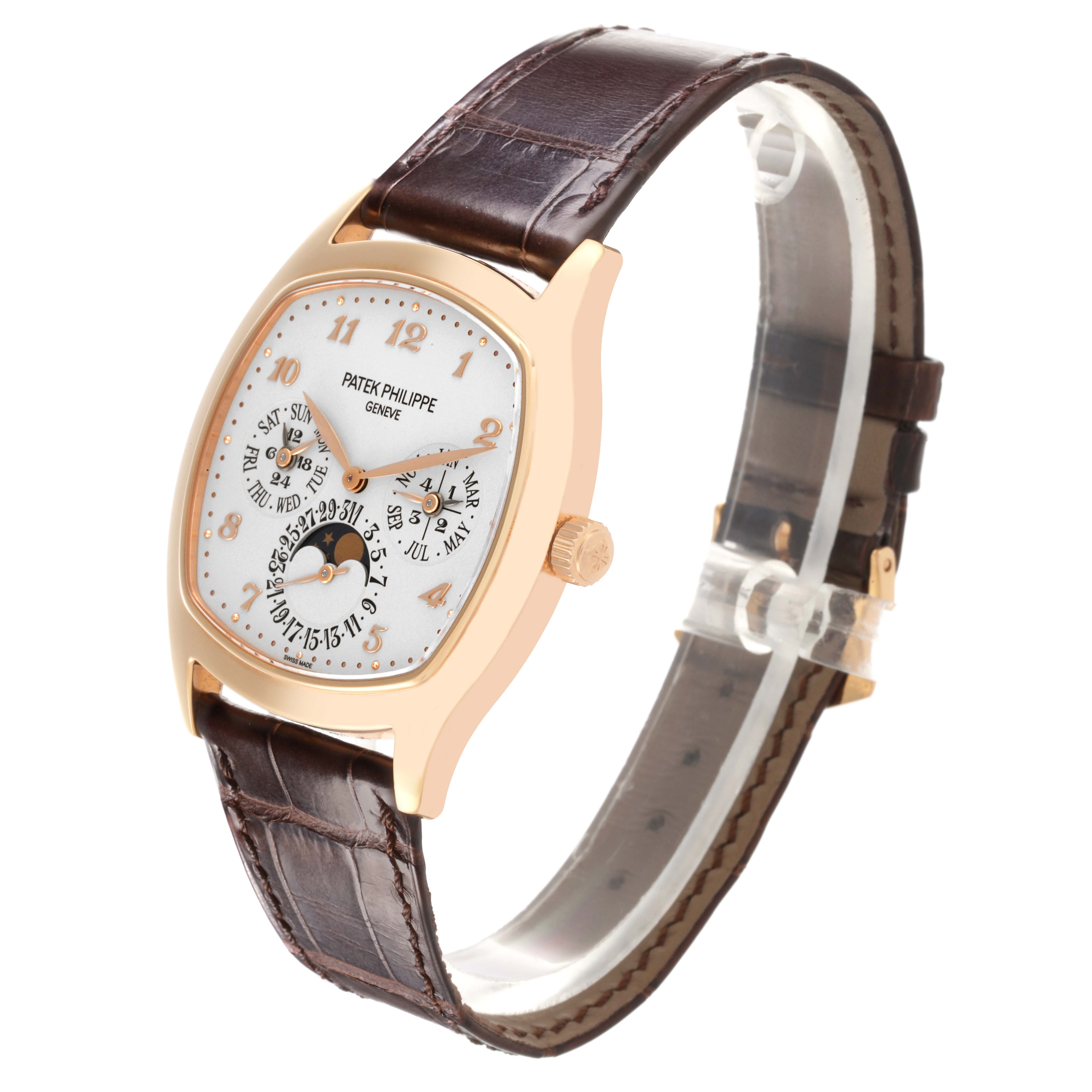 The Patek Philippe Complications 5940R - 001 Men's Rose Gold Silver Dial 5940R - 001 Men's Rose Gold Silver Dial watch is shown from an angled front view, highlighting the dial and leather strap.