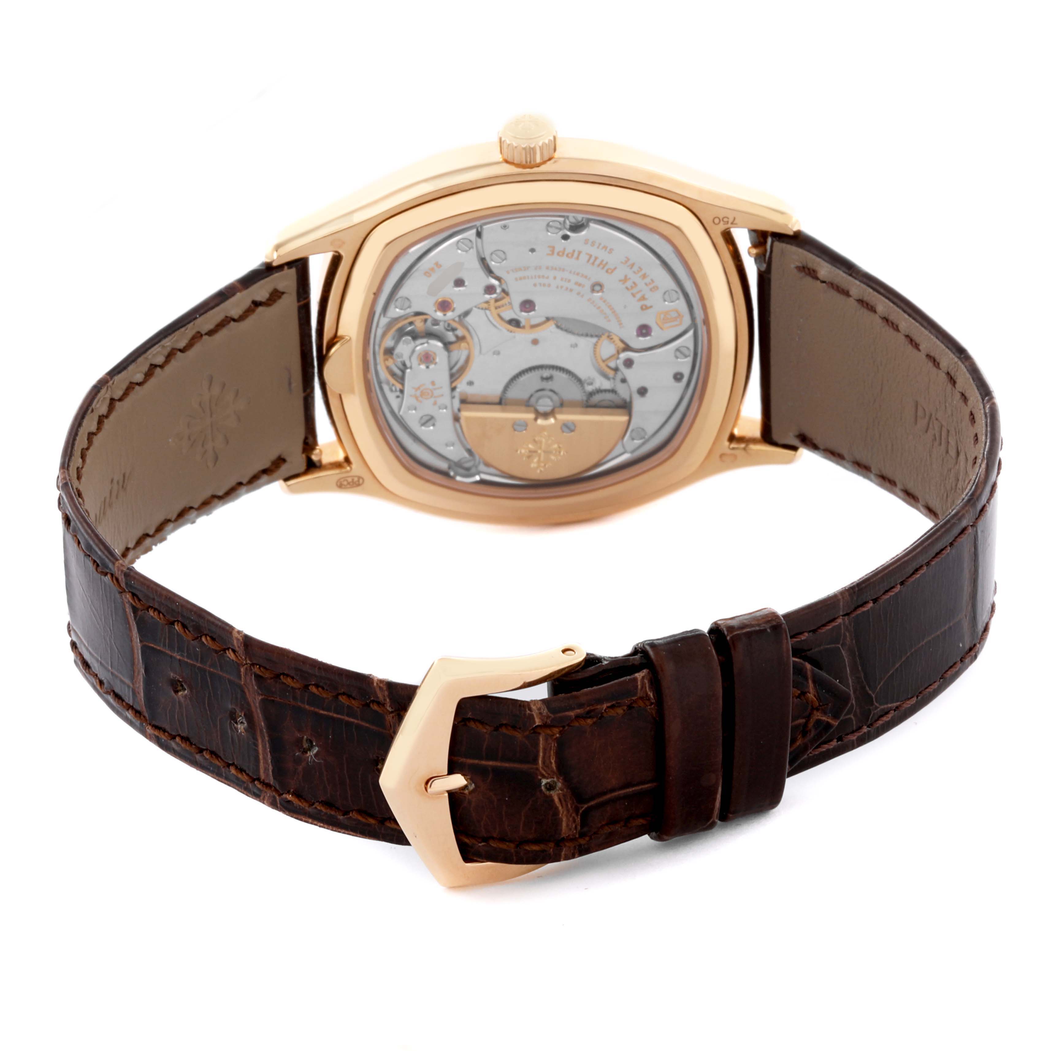 The image shows the back view of a Patek Philippe Complications 5940R - 001 Men's Rose Gold Silver Dial 5940R - 001 Men's Rose Gold Silver Dial watch, highlighting the movement and leather strap.