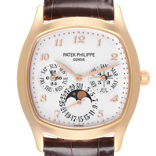 The Patek Philippe Complications watch is shown from a front angle, displaying the dial and case.