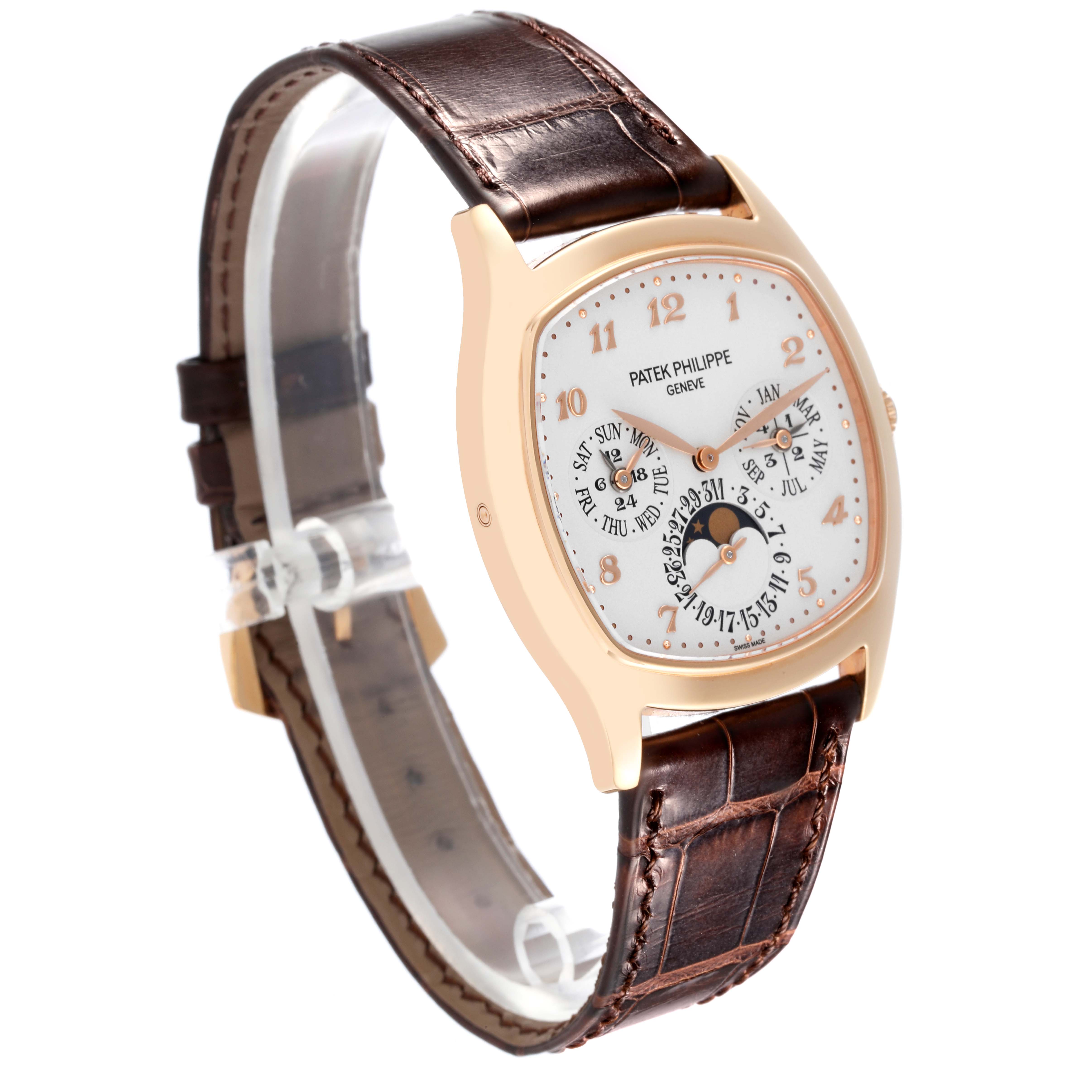 The Patek Philippe Complications 5940R - 001 Men's Rose Gold Silver Dial 5940R - 001 Men's Rose Gold Silver Dial watch is shown at a three-quarter angle, highlighting the dial, case, and leather strap.