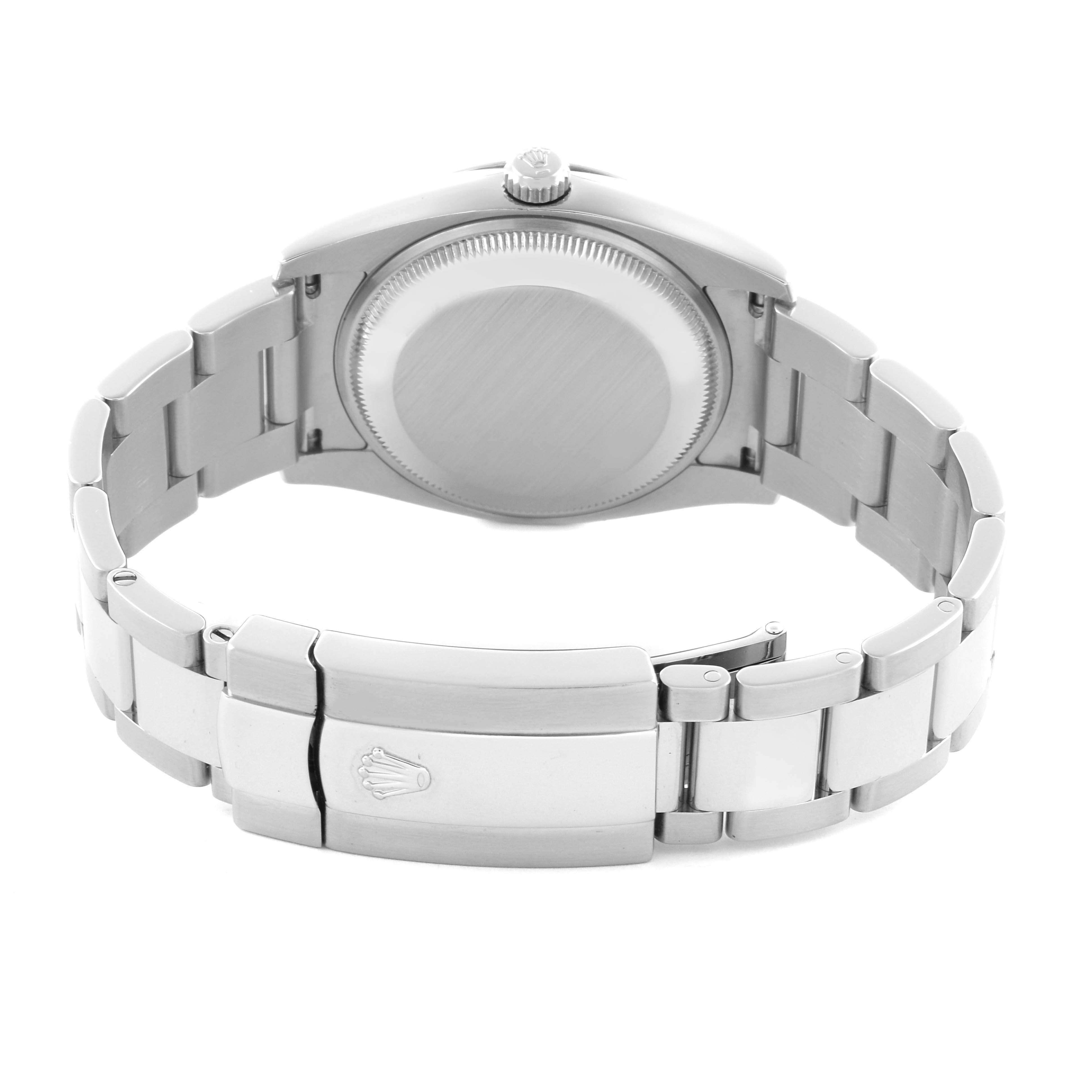 The Rolex Date 115234 Men's Stainless Steel Black Dial 115234 Men's Stainless Steel Black Dial watch is shown from the back, highlighting the case back, bracelet, and clasp.