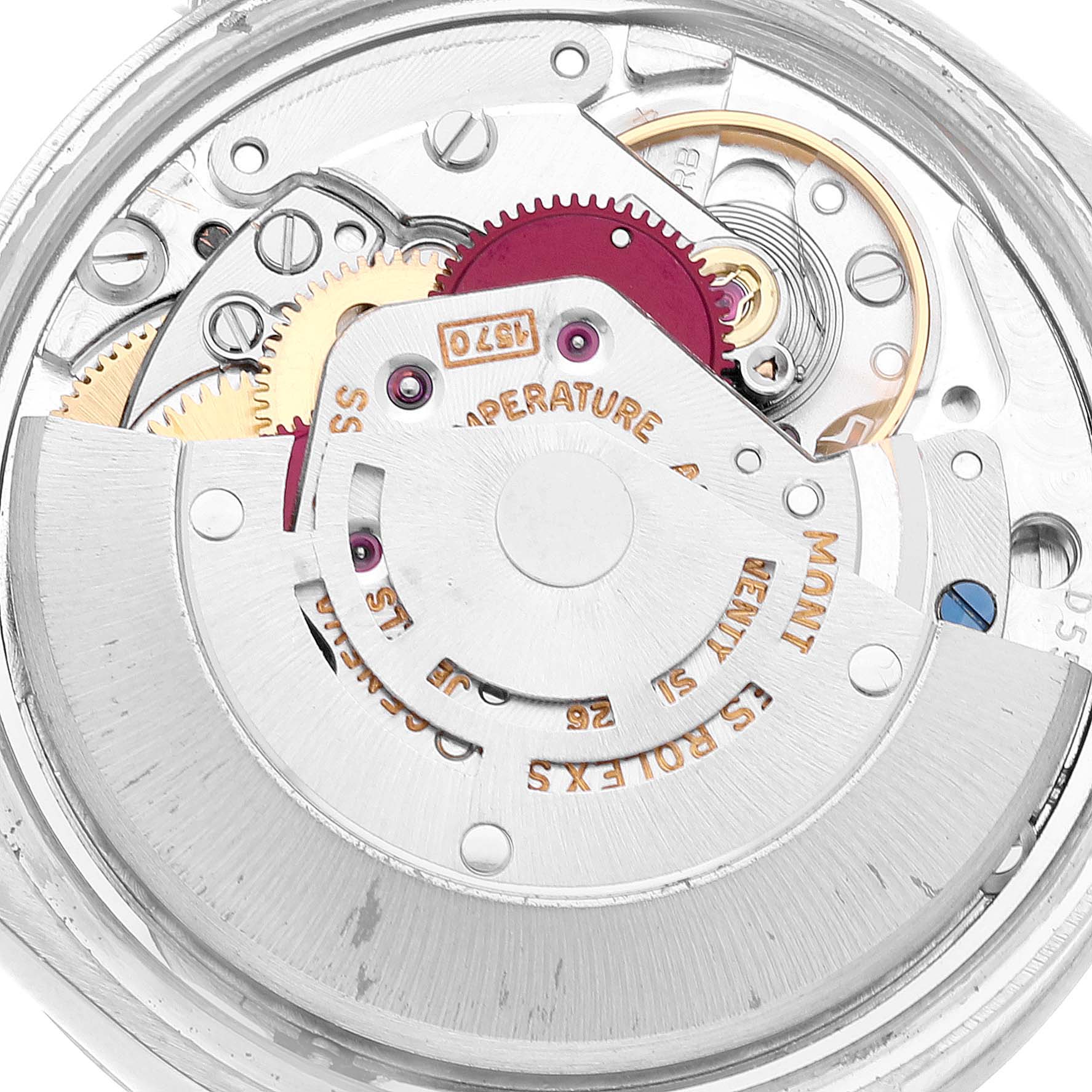 This image shows a close-up of the inner movement parts of a Vintage Collection model by Rolex.