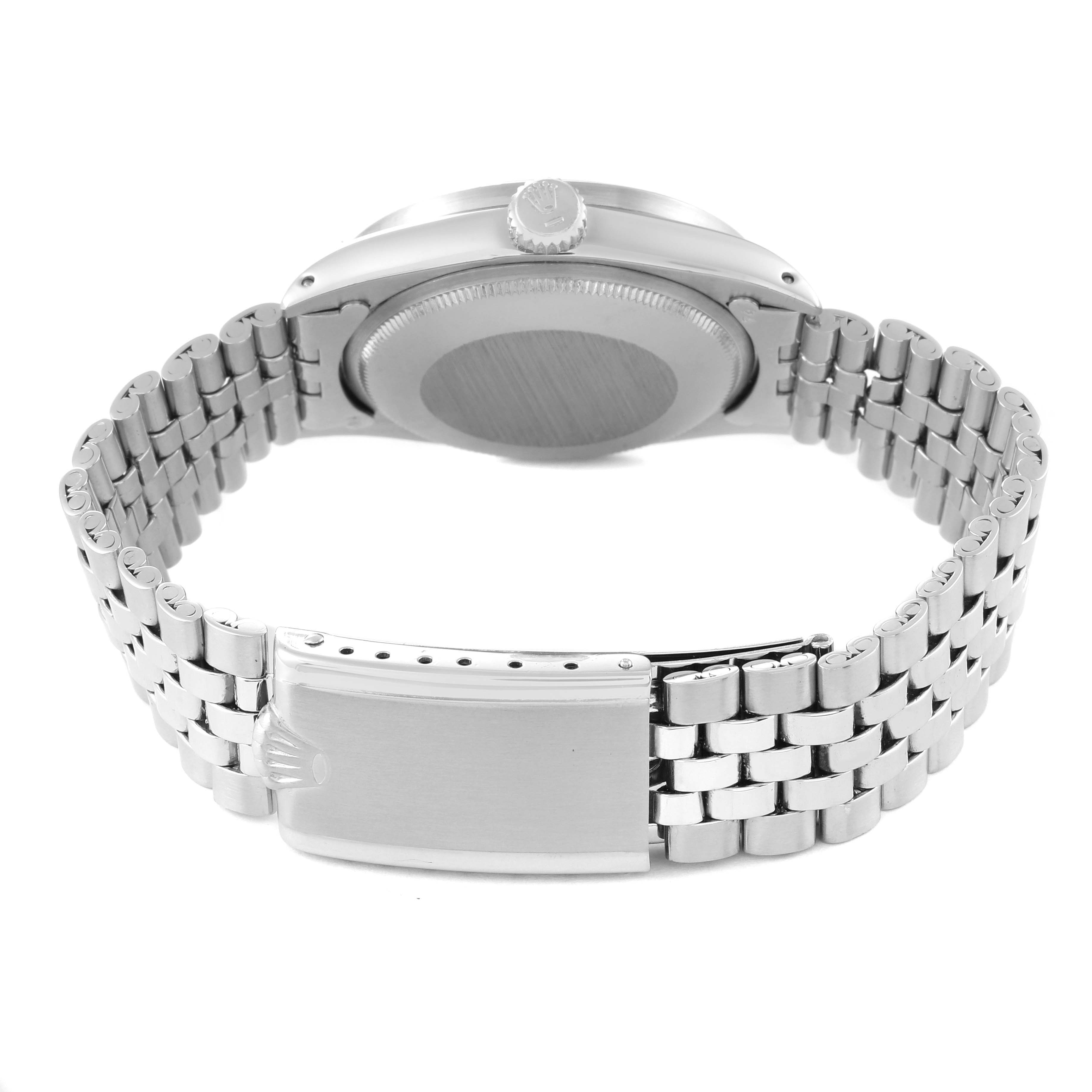 The image shows the rear view of a Rolex Vintage Collection 1501 Men's Stainless Steel Blue Dial 1501 Men's Stainless Steel Blue Dial watch, featuring its clasp, case back, and bracelet.