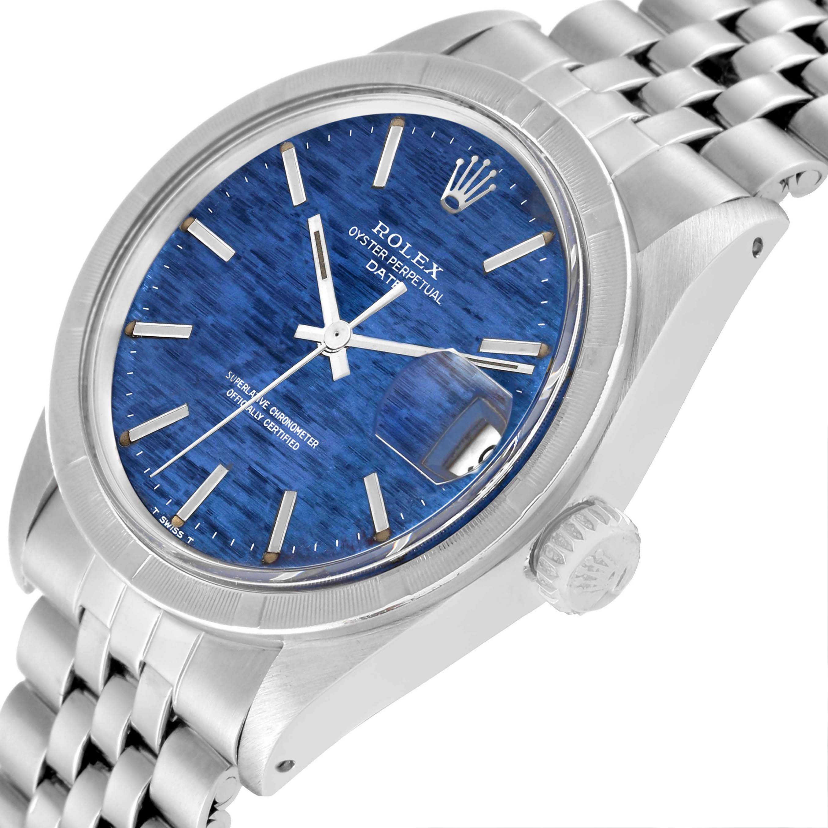 The Rolex Vintage Collection 1501 Men's Stainless Steel Blue Dial 1501 Men's Stainless Steel Blue Dial model watch is shown at an angled close-up, highlighting its blue dial, date magnifier, and metal bracelet.