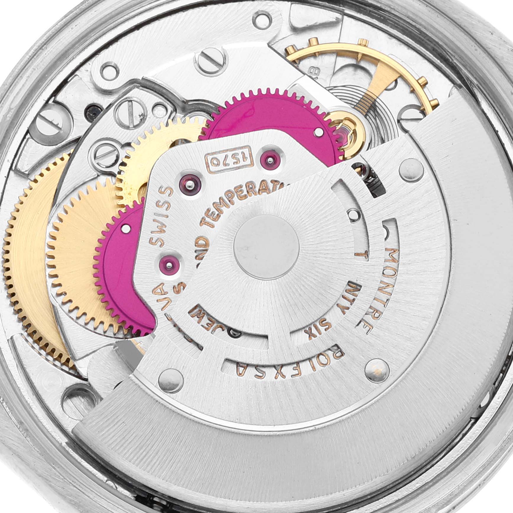 This image shows a close-up view of the internal mechanism of a Rolex Vintage Collection 1500 Men's Stainless Steel Blue Dial 1500 Men's Stainless Steel Blue Dial watch, highlighting gears and components.