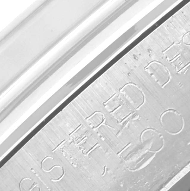 The image shows a close-up angle of the inner case details of a Rolex Vintage Collection 1500 Men's Stainless Steel Blue Dial 1500 Men's Stainless Steel Blue Dial watch.