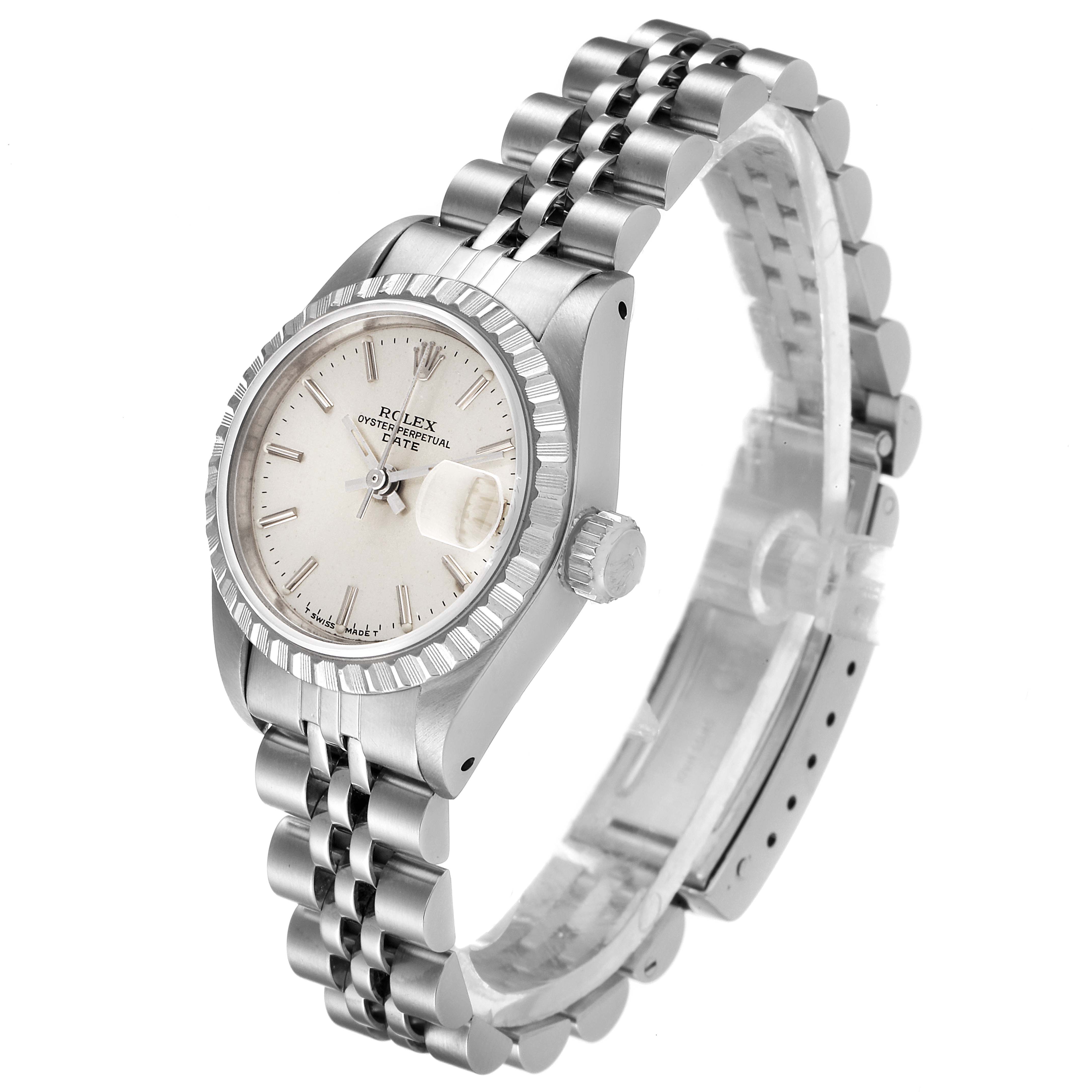The Rolex Date 69240 Women
s Stainless Steel Silver Dial 69240 Women
s Stainless Steel Silver Dial model watch is shown at an angle highlighting its face, bezel, crown, and stainless steel bracelet.