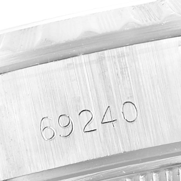 This image shows a close-up of the case side with the model number etched on a Rolex Date 69240 Women
s Stainless Steel Silver Dial 69240 Women
s Stainless Steel Silver Dial watch.