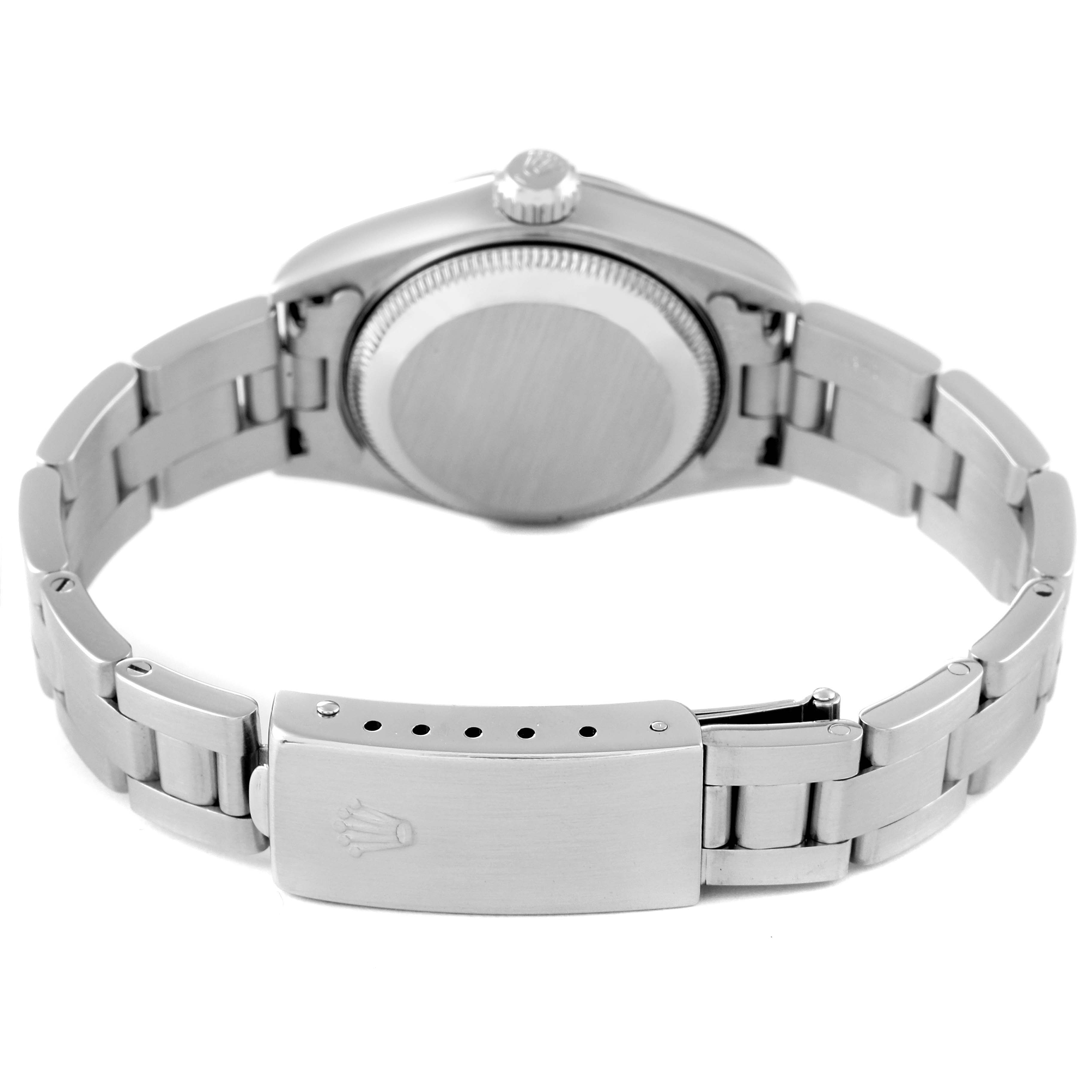 This image shows the backside and bracelet clasp of a Rolex Date 79160 Women
s Stainless Steel White Dial 79160 Women
s Stainless Steel White Dial model watch in a slightly opened position.