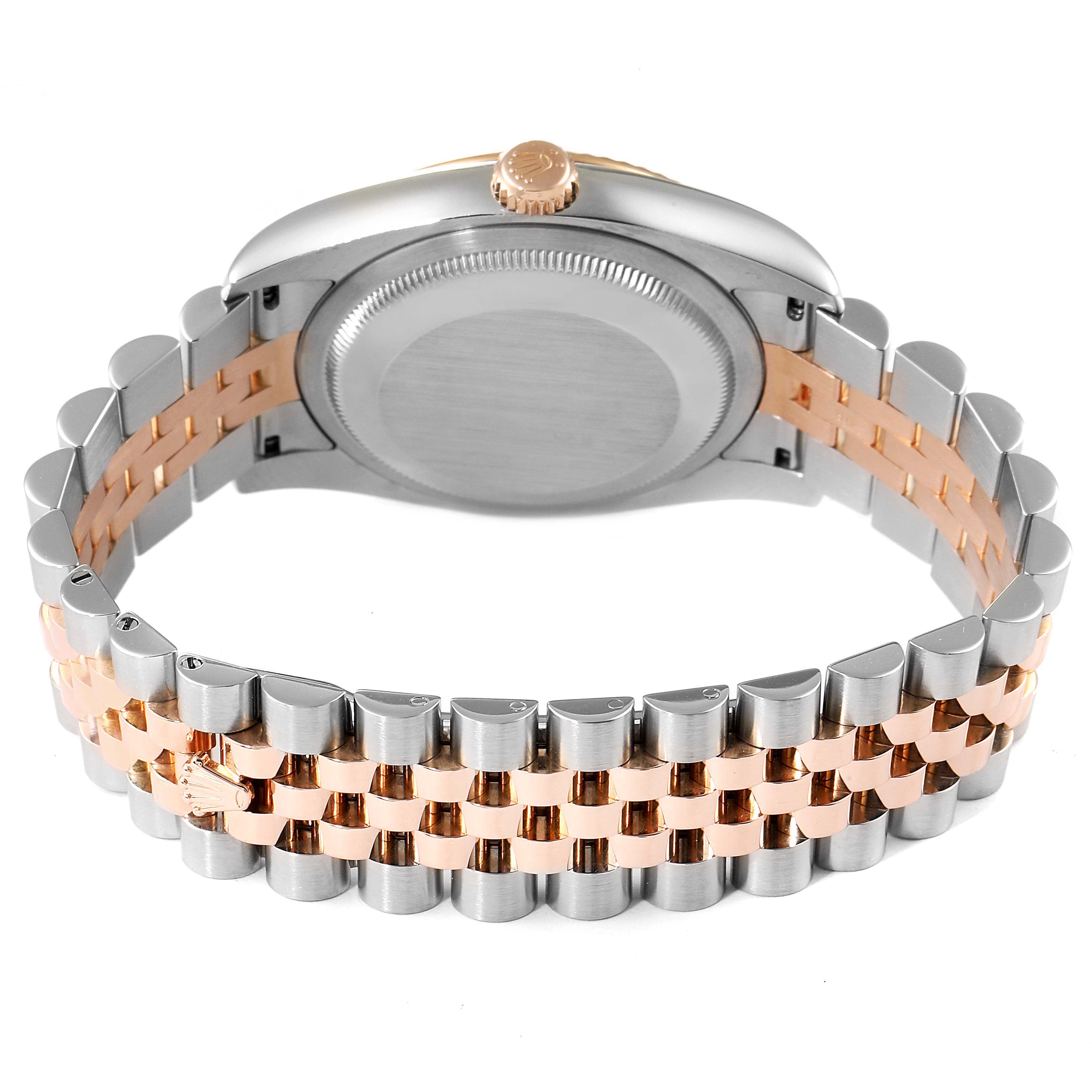 The image shows the back and partially the side of a Rolex Datejust 116231 Men
s Steel and Gold (two tone) Grey Dial 116231 Men
s Steel and Gold (two tone) Grey Dial watch, highlighting its two-tone bracelet.