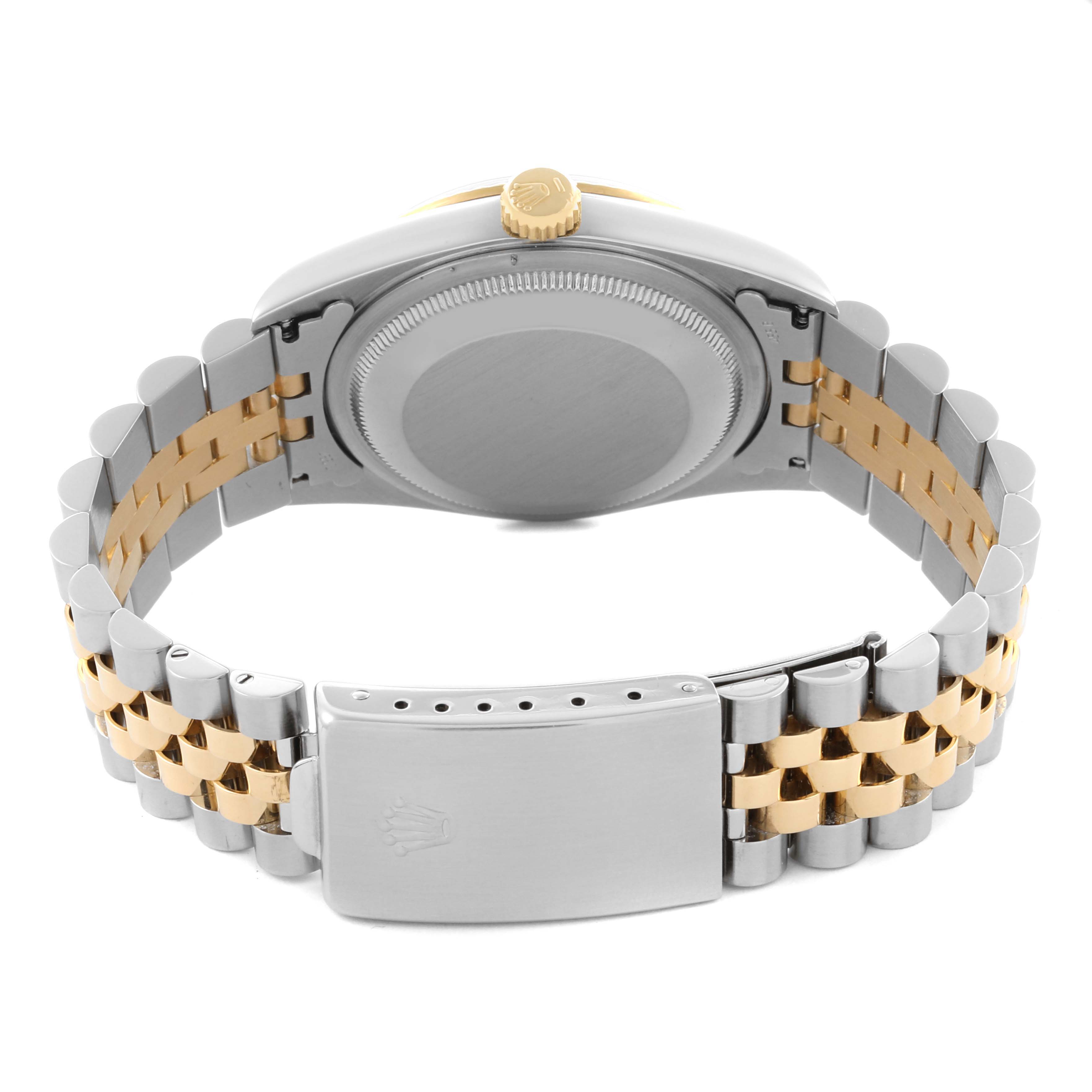 This image shows the back and clasp of a Rolex Datejust 16233 Men's Steel and Gold (two tone) Champagne Dial 16233 Men's Steel and Gold (two tone) Champagne Dial, highlighting the case, bracelet, and crown.