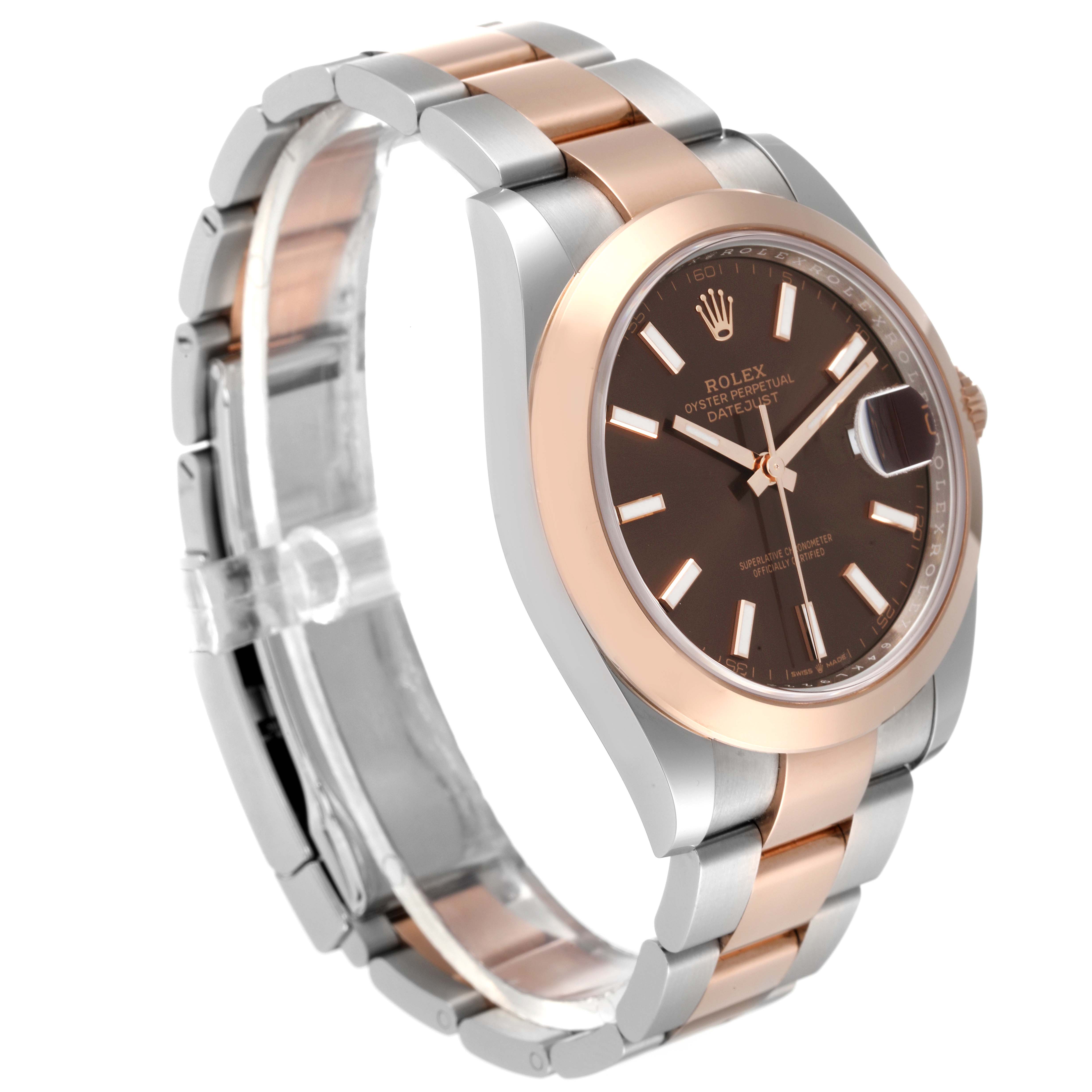 The Rolex Datejust 41 126301 Men
s Steel and Gold (two tone) Brown Dial 126301 Men
s Steel and Gold (two tone) Brown Dial watch is shown at a three-quarter angle, displaying its dial, bezel, and part of its bracelet.