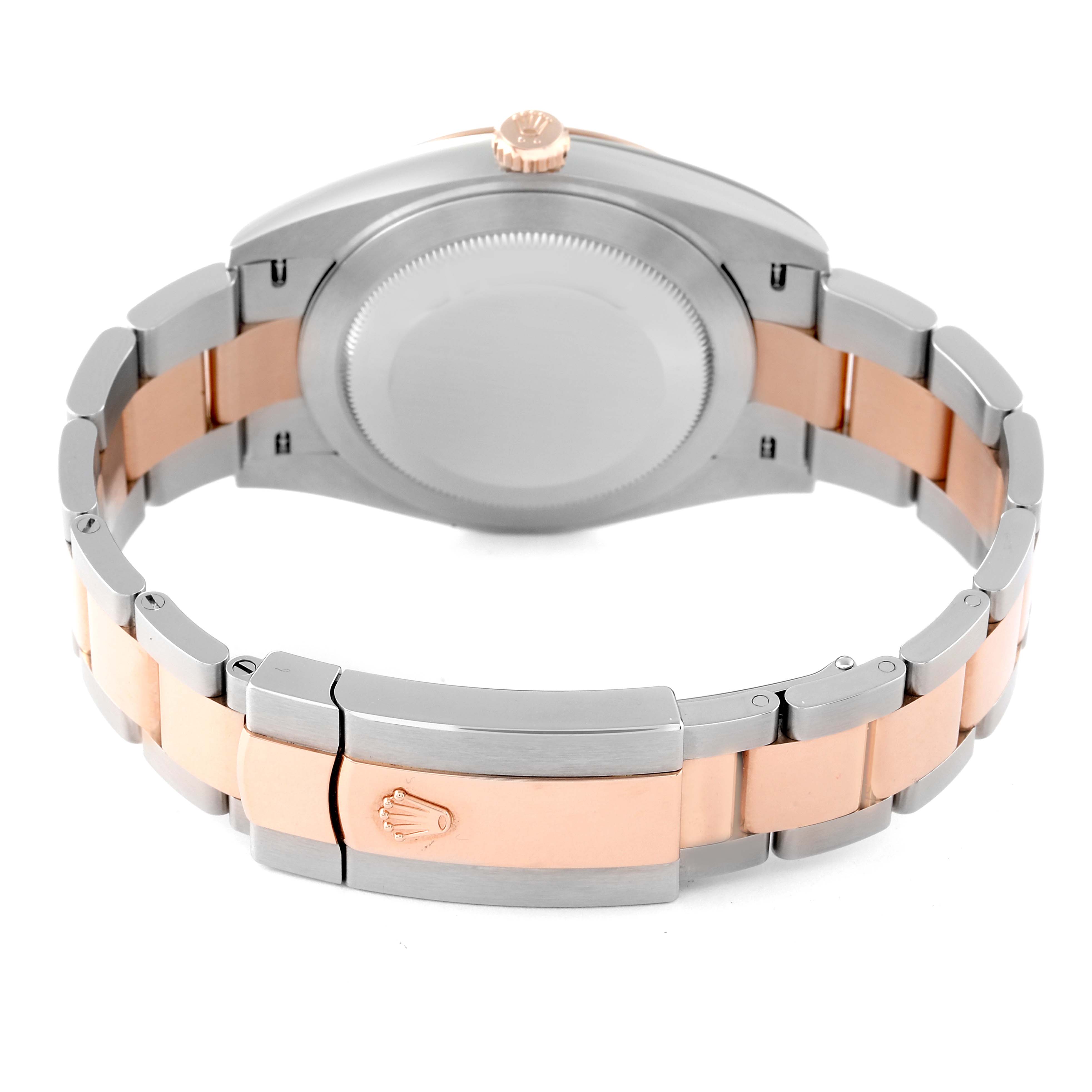 The Rolex Datejust 41 126301 Men
s Steel and Gold (two tone) Brown Dial 126301 Men
s Steel and Gold (two tone) Brown Dial watch is shown from the back, highlighting its case, crown, and two-tone bracelet with clasp.