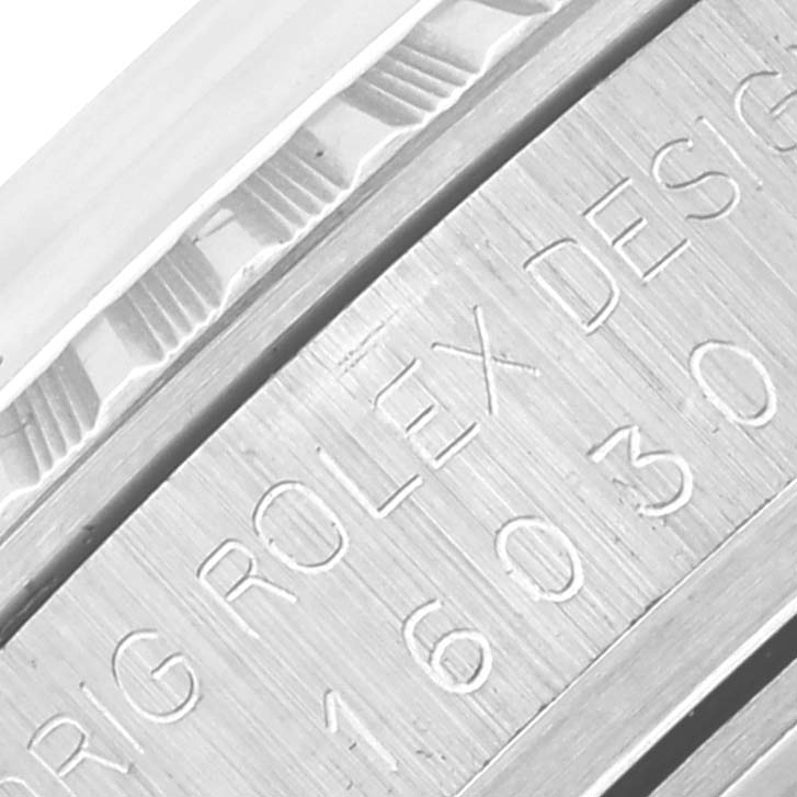 The image shows a close-up of the engraved model number and design details on a Rolex Datejust 16030 Men's Stainless Steel Silver Dial 16030 Men's Stainless Steel Silver Dial watch case.