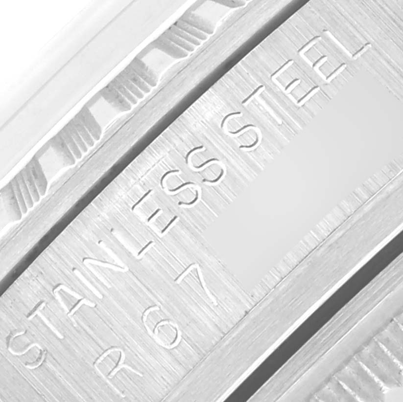 This image shows a close-up of the engraved edge detailing and text on the case of a Rolex Datejust 16030 Men's Stainless Steel Silver Dial 16030 Men's Stainless Steel Silver Dial watch.