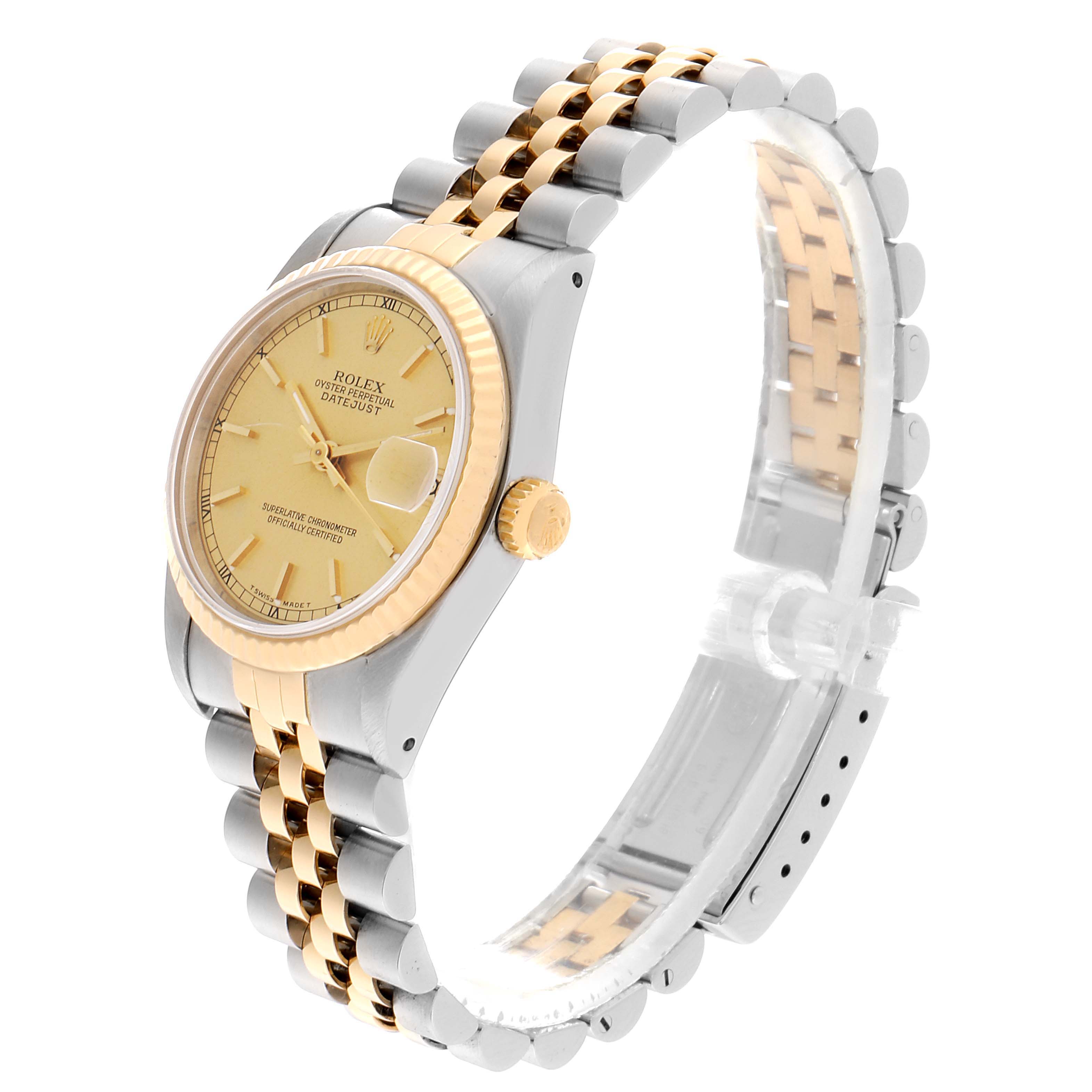The image shows a Rolex Datejust Mid-Size model from a tilted angle, highlighting the face, crown, and bracelet.