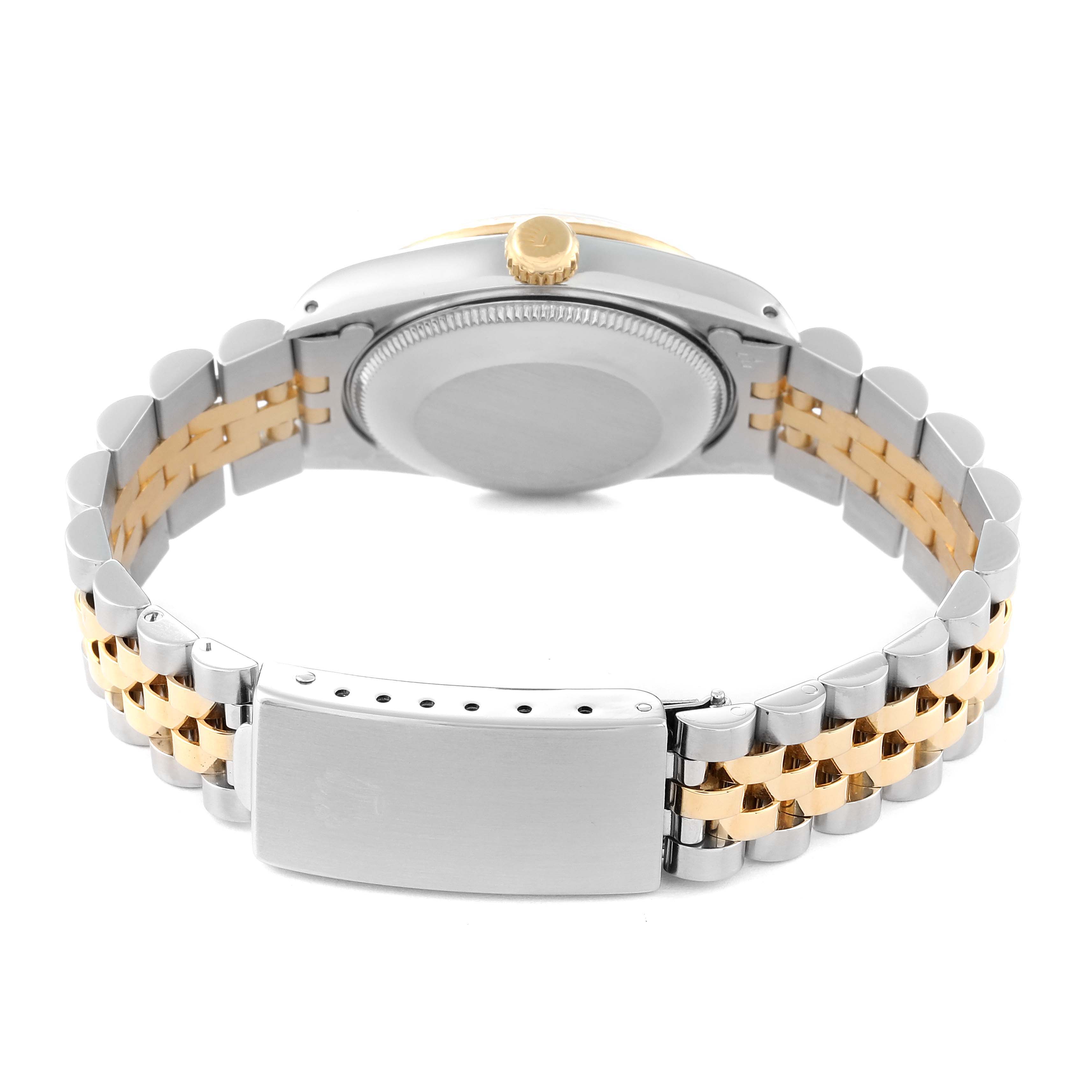 The image shows the back and bracelet of a Rolex Mid-Size 68273 Women's Steel and Gold (two tone) Champagne Dial 68273 Women's Steel and Gold (two tone) Champagne Dial model watch, specifically highlighting the stainless steel and gold link bracelet.