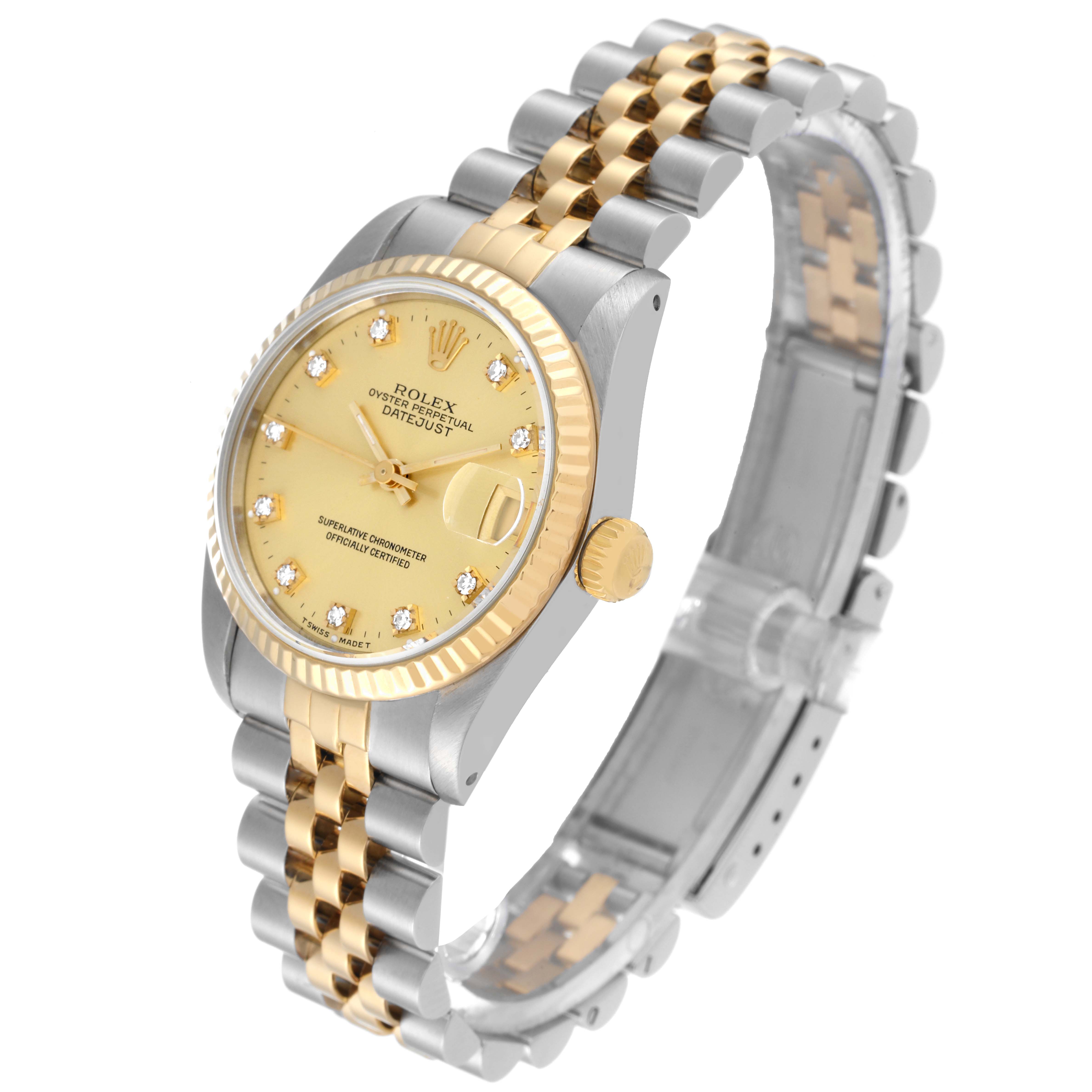 Mid-angle view of a Rolex Datejust Mid-Size watch, showing the gold and silver bracelet, bezel, dial, and crown.