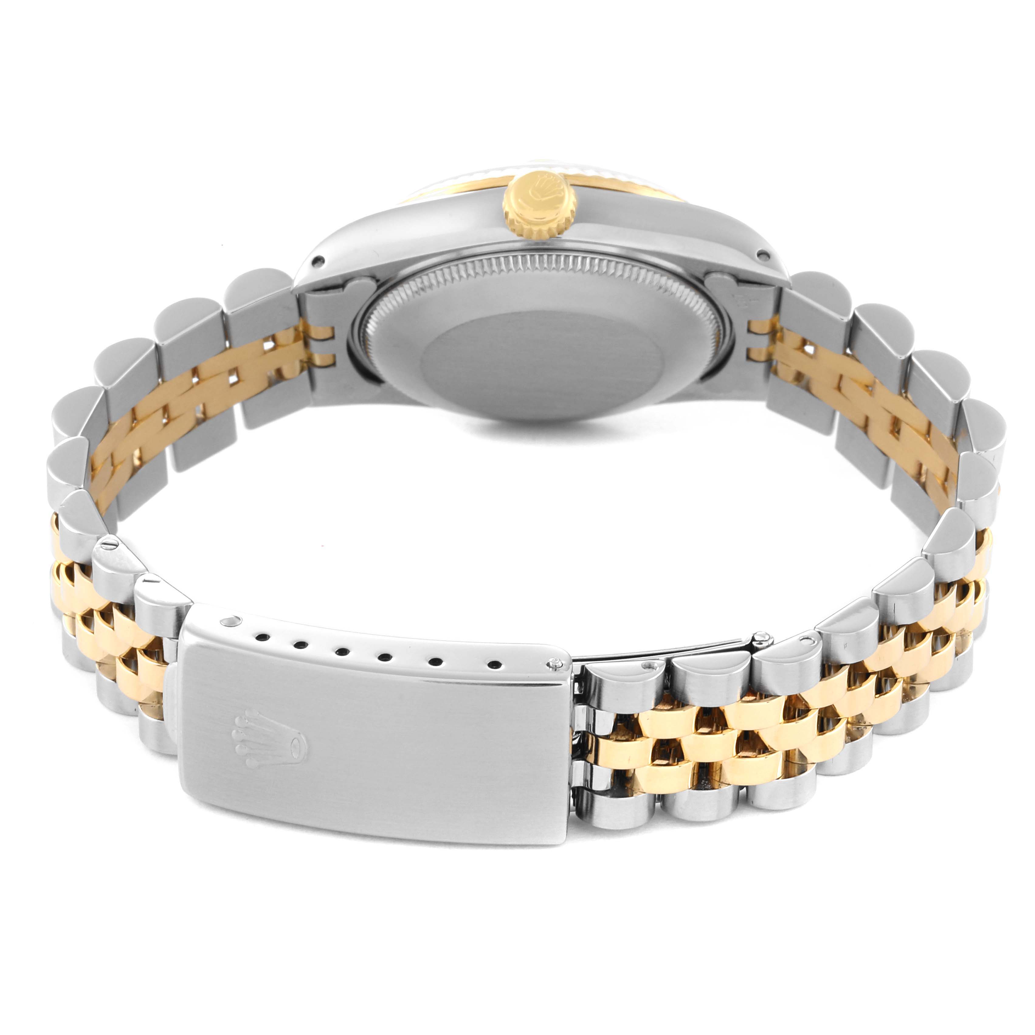 The image shows the back view of a Mid-Size Rolex watch, highlighting the two-tone bracelet and the closed clasp.