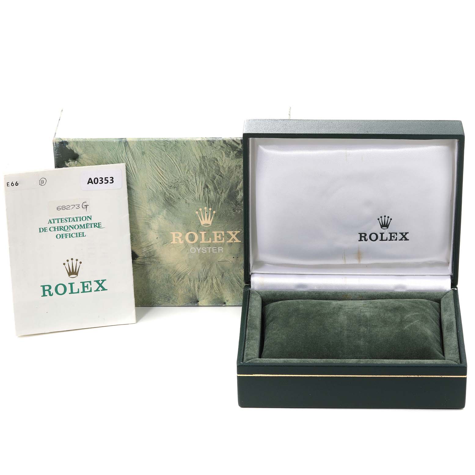 The image shows the open box, outer box, and certification booklet for a Mid-Size Rolex watch.