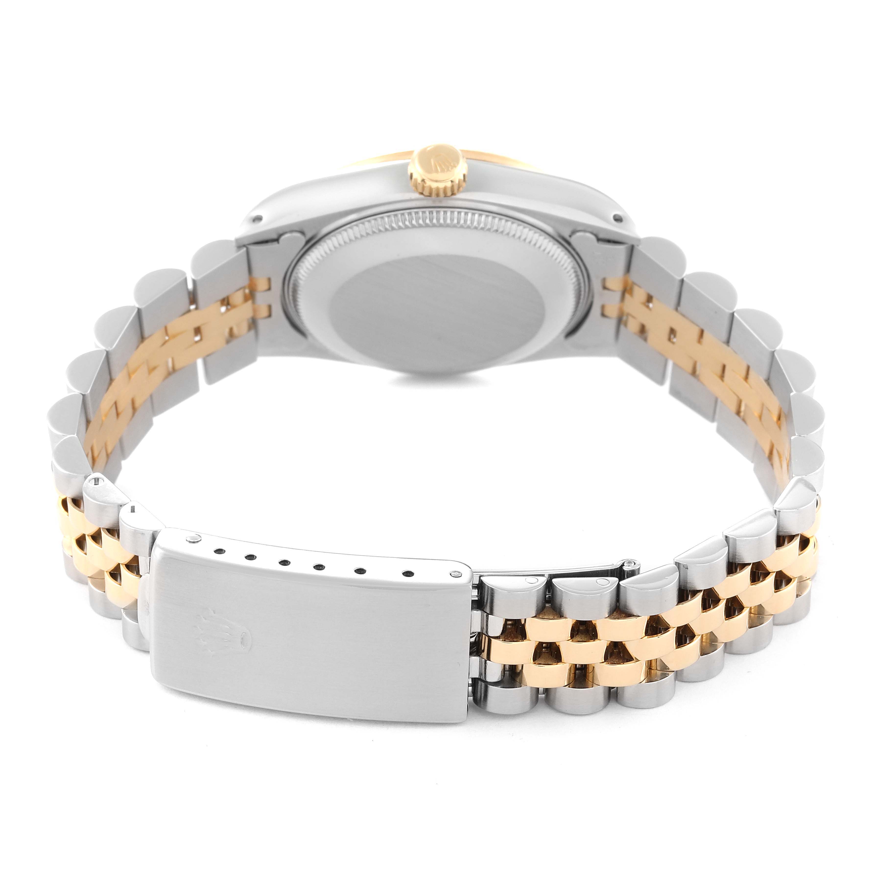 The image shows the back and bracelet of a mid-size Rolex watch, highlighting its two-tone metal design.