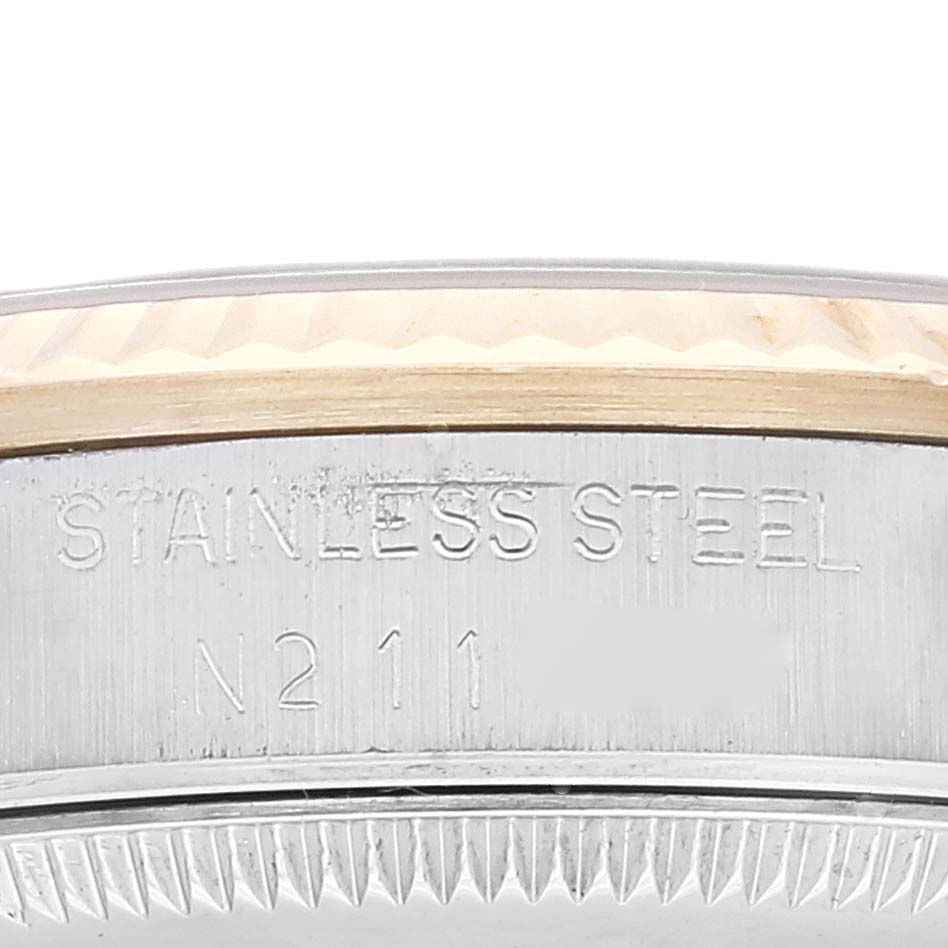 This image shows the stainless steel case and bezel of a Rolex Mid-Size 68273 Women's Steel and Gold (two tone) Champagne Dial 68273 Women's Steel and Gold (two tone) Champagne Dial model watch from a close-up angle.